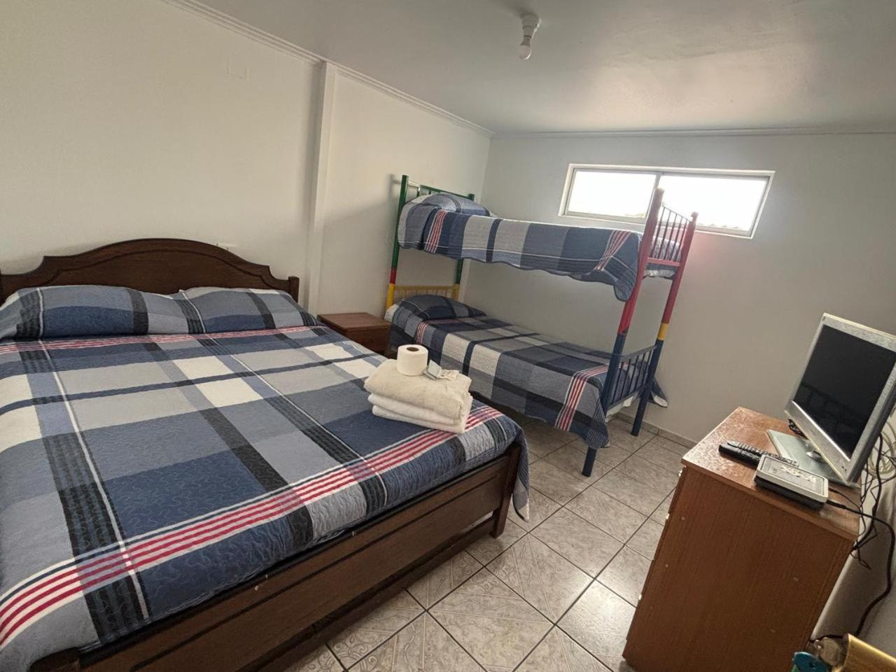 Quadruple Room with Shared Bathroom