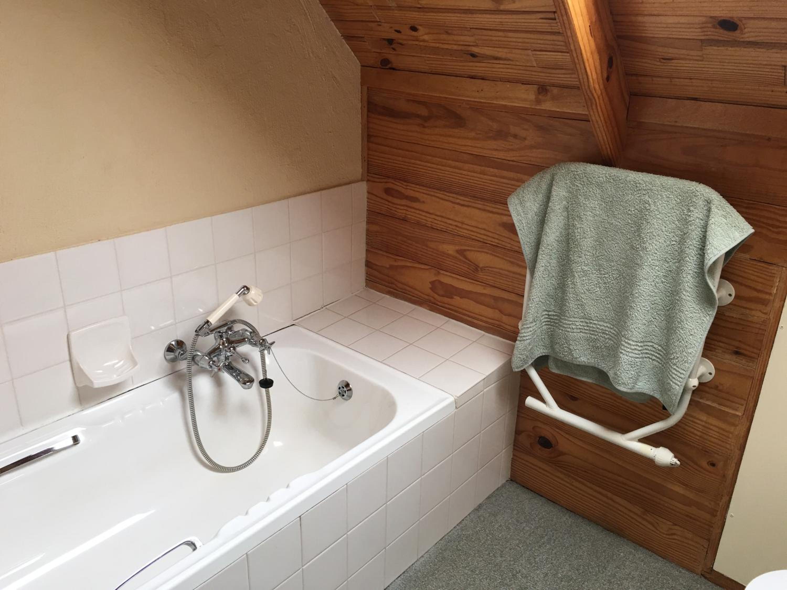 Three-Bedroom House - Photo 22