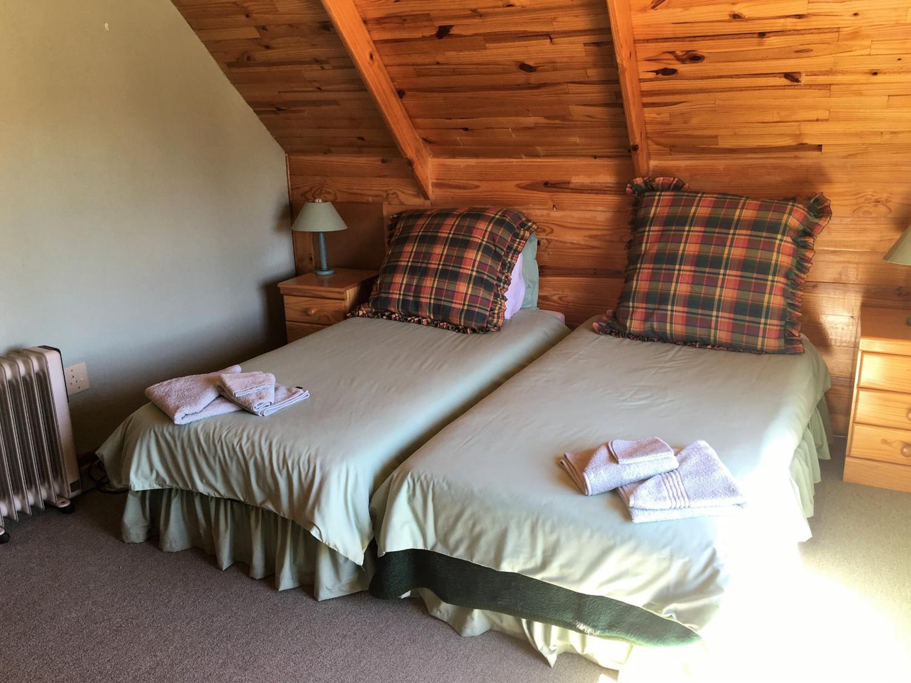 Three-Bedroom House - Photo 25