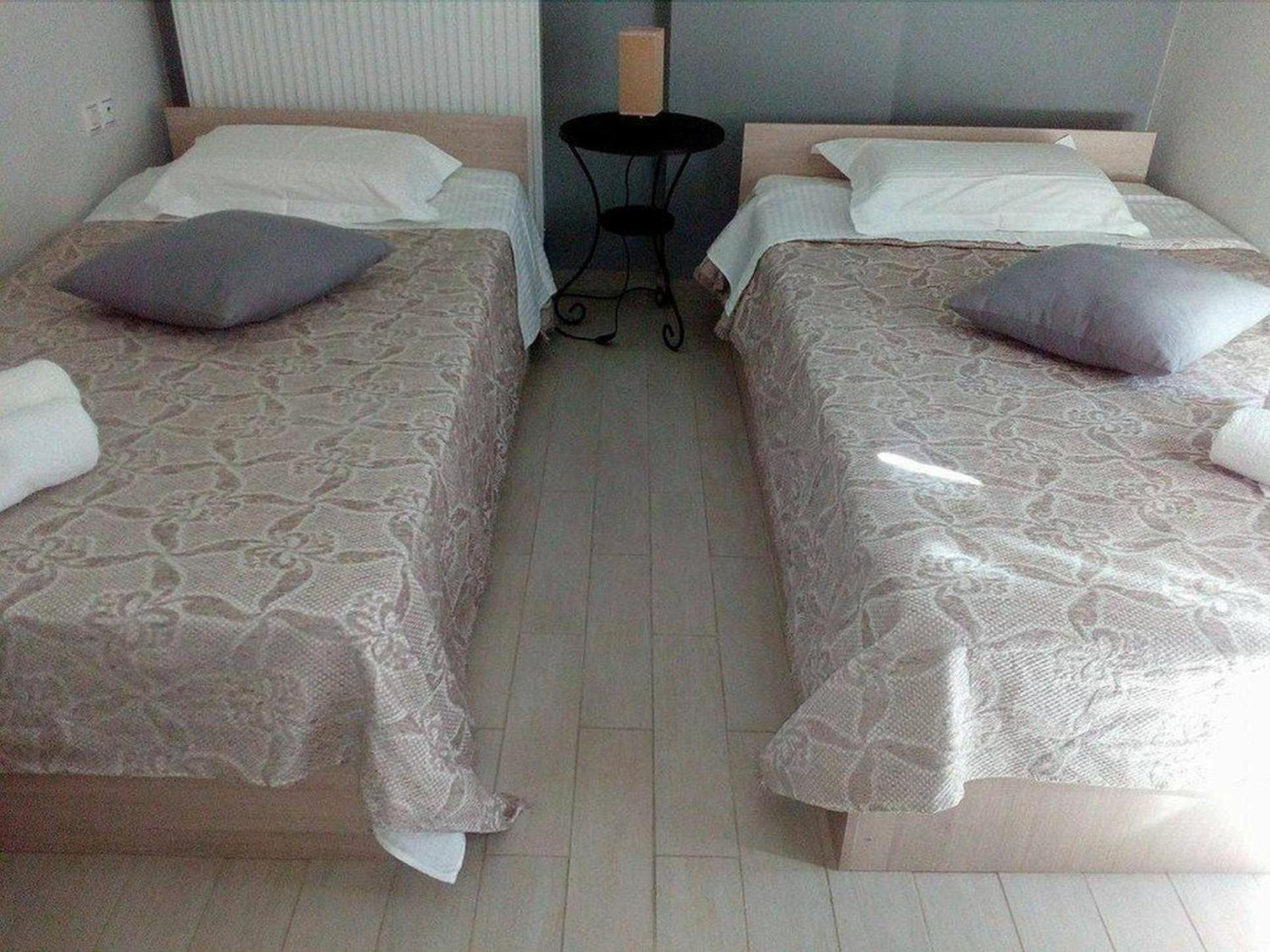 Three-Bedroom House - Photo 34