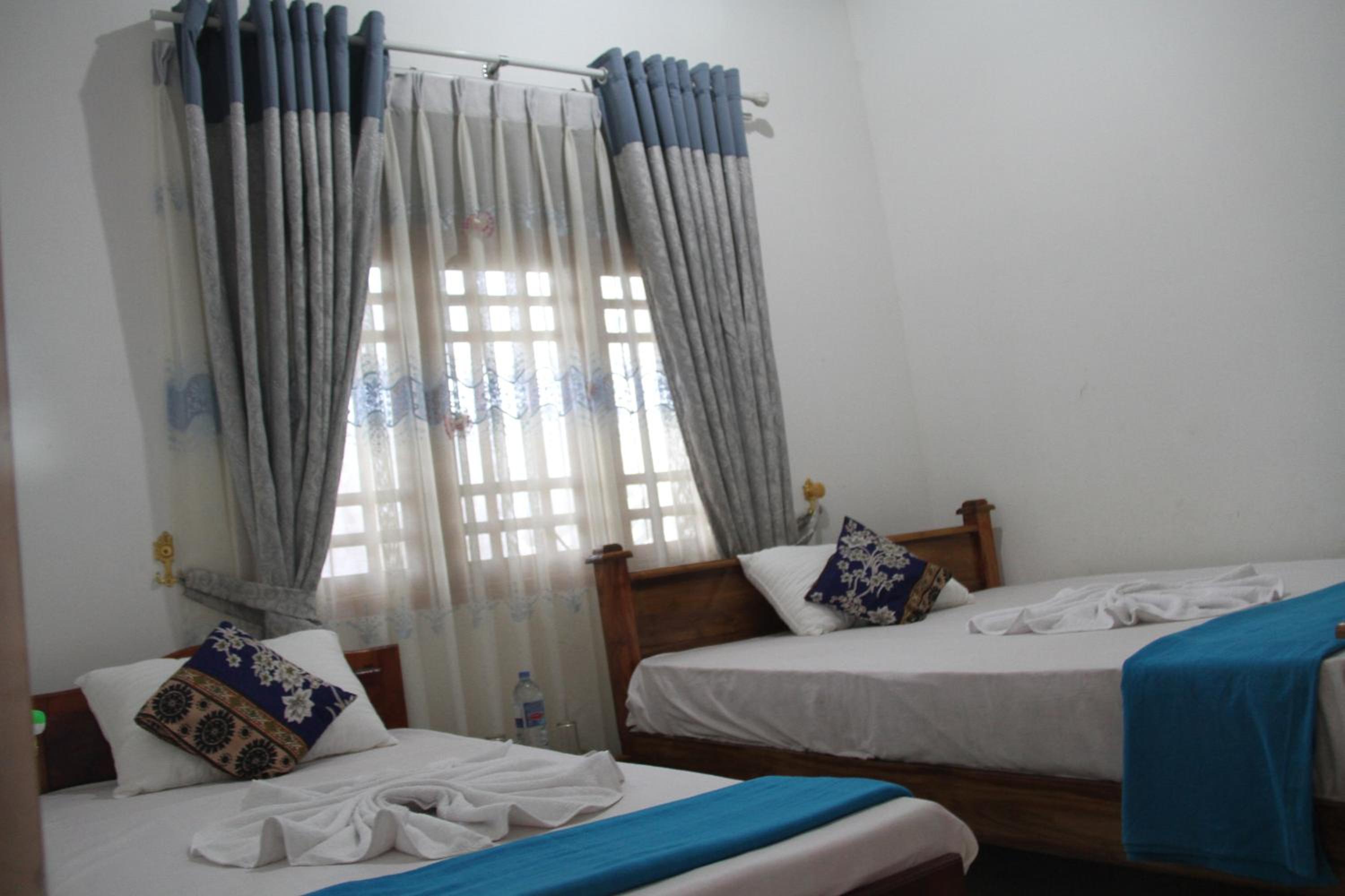 Basic Triple Room with Shared Bathroom photo 3