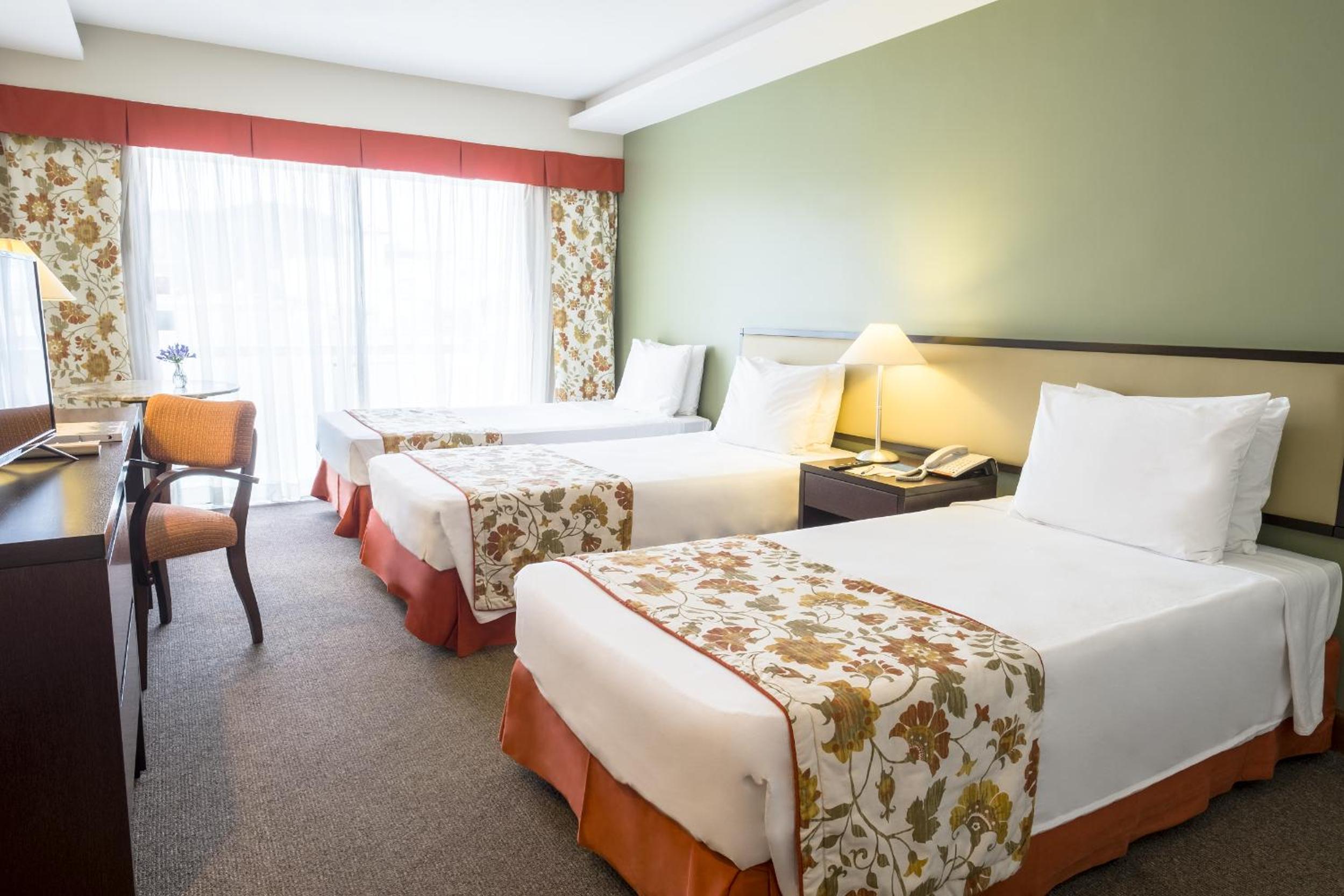 Classic Triple Room with Side Sea View thumbnail 6