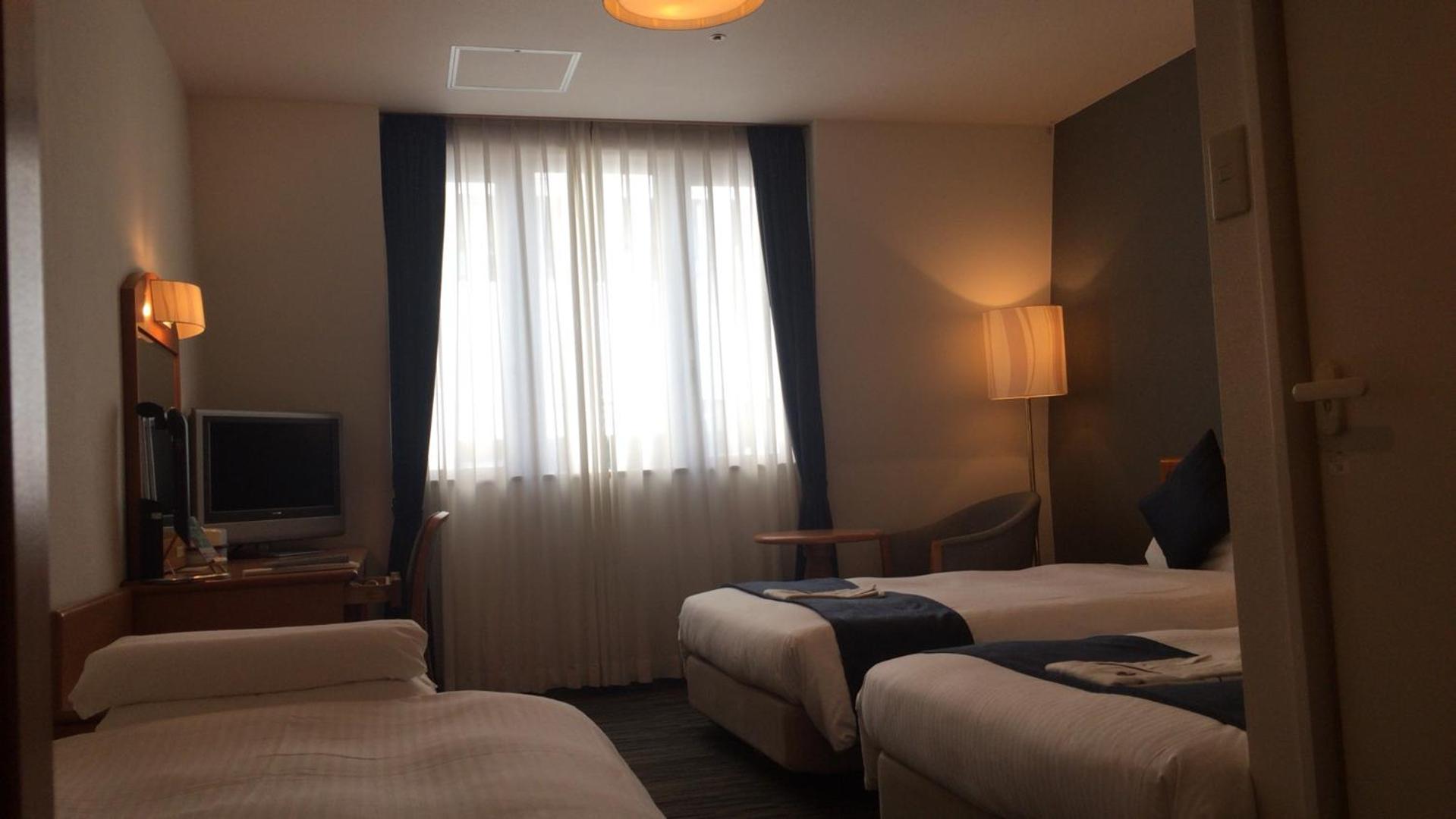 Twin Room with Extra Bed - Non-Smoking - Photo 4