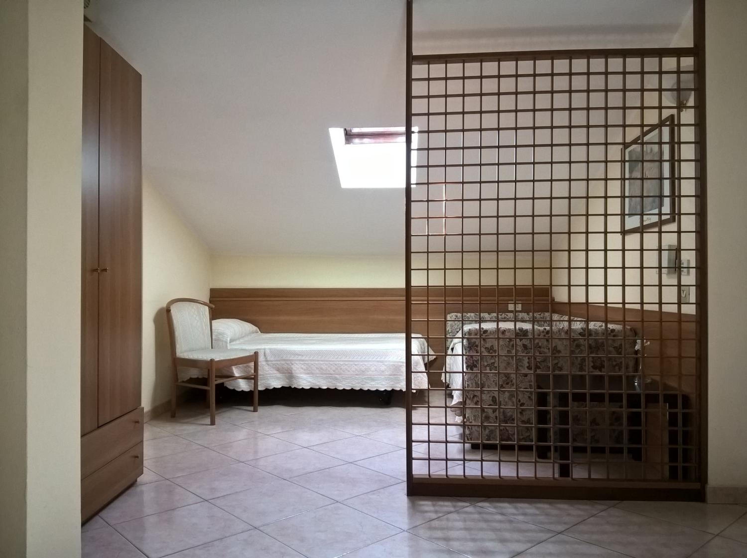 Quadruple Room with Private Bathroom - Photo 1
