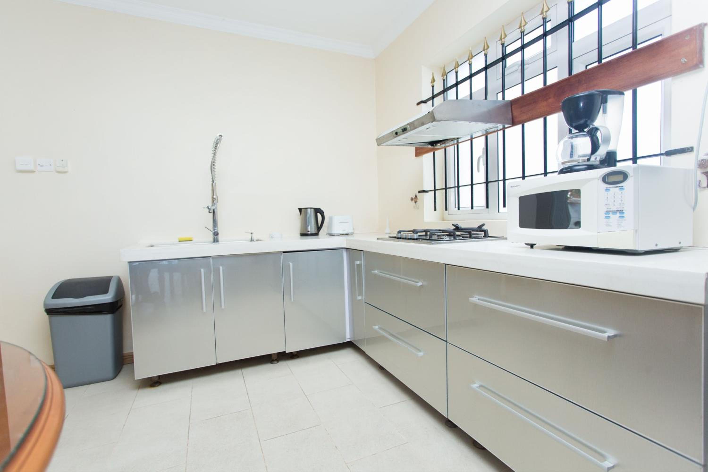 Three-Bedroom Apartment - Photo 7