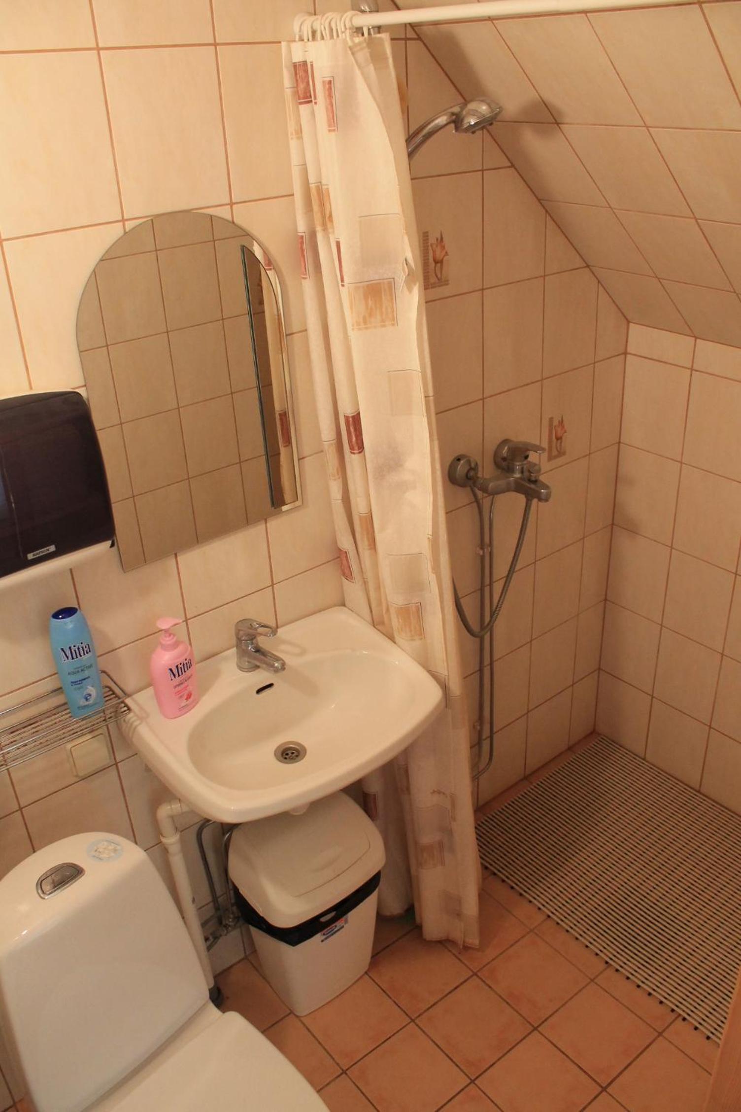 Three-Bedroom House - Photo 18