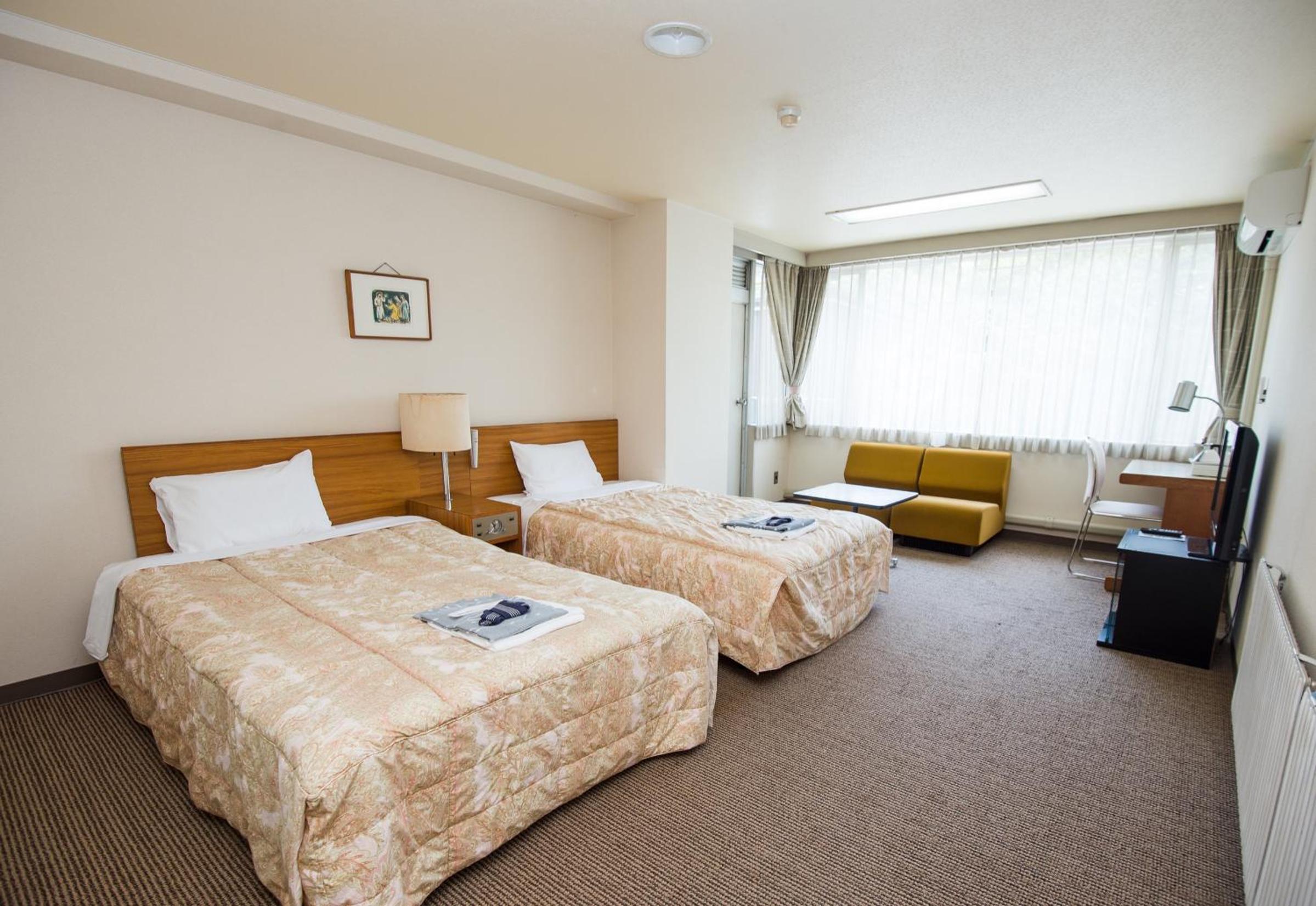 Twin Room With Private Bathroom