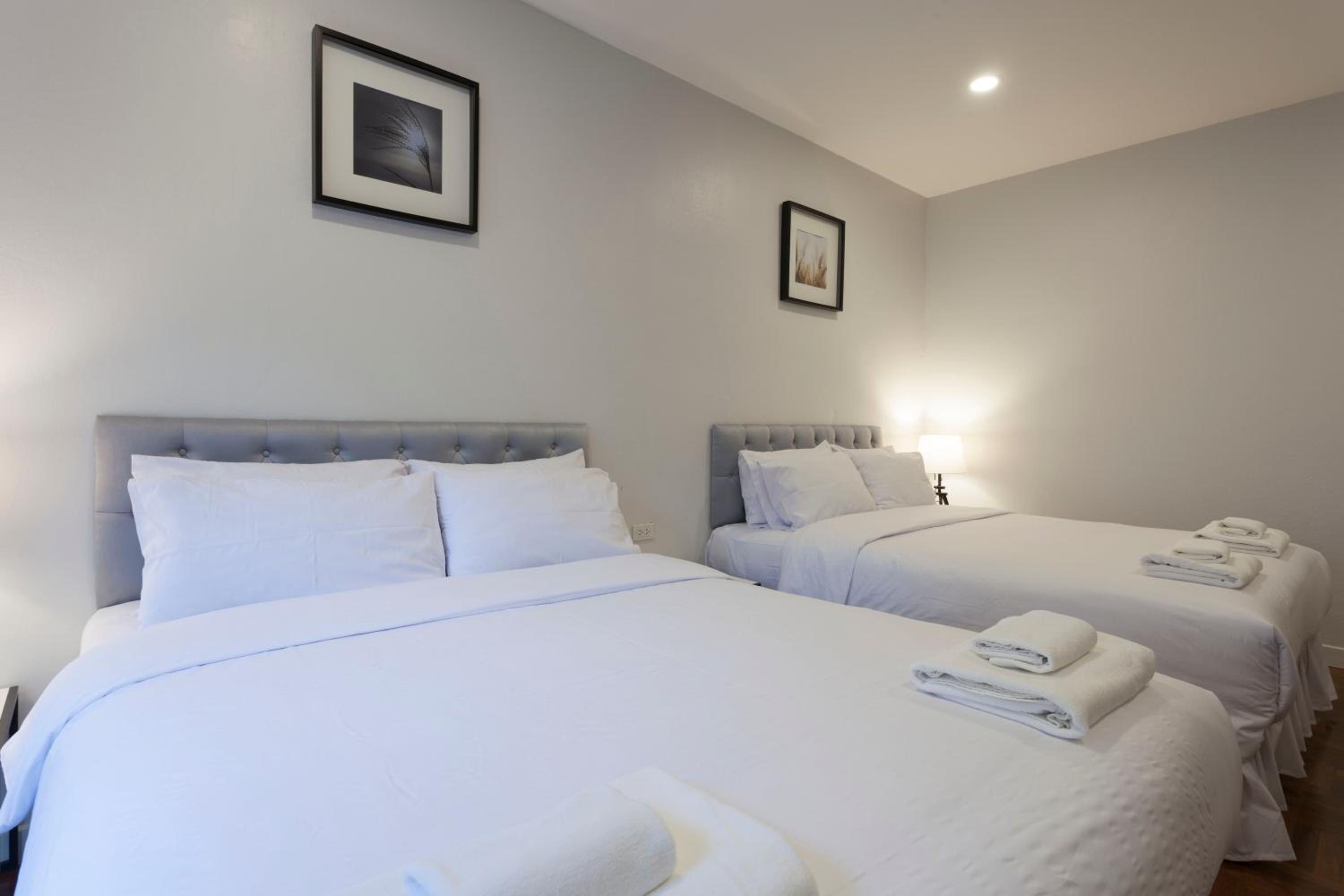 Deluxe Quadruple Room - Photo 11