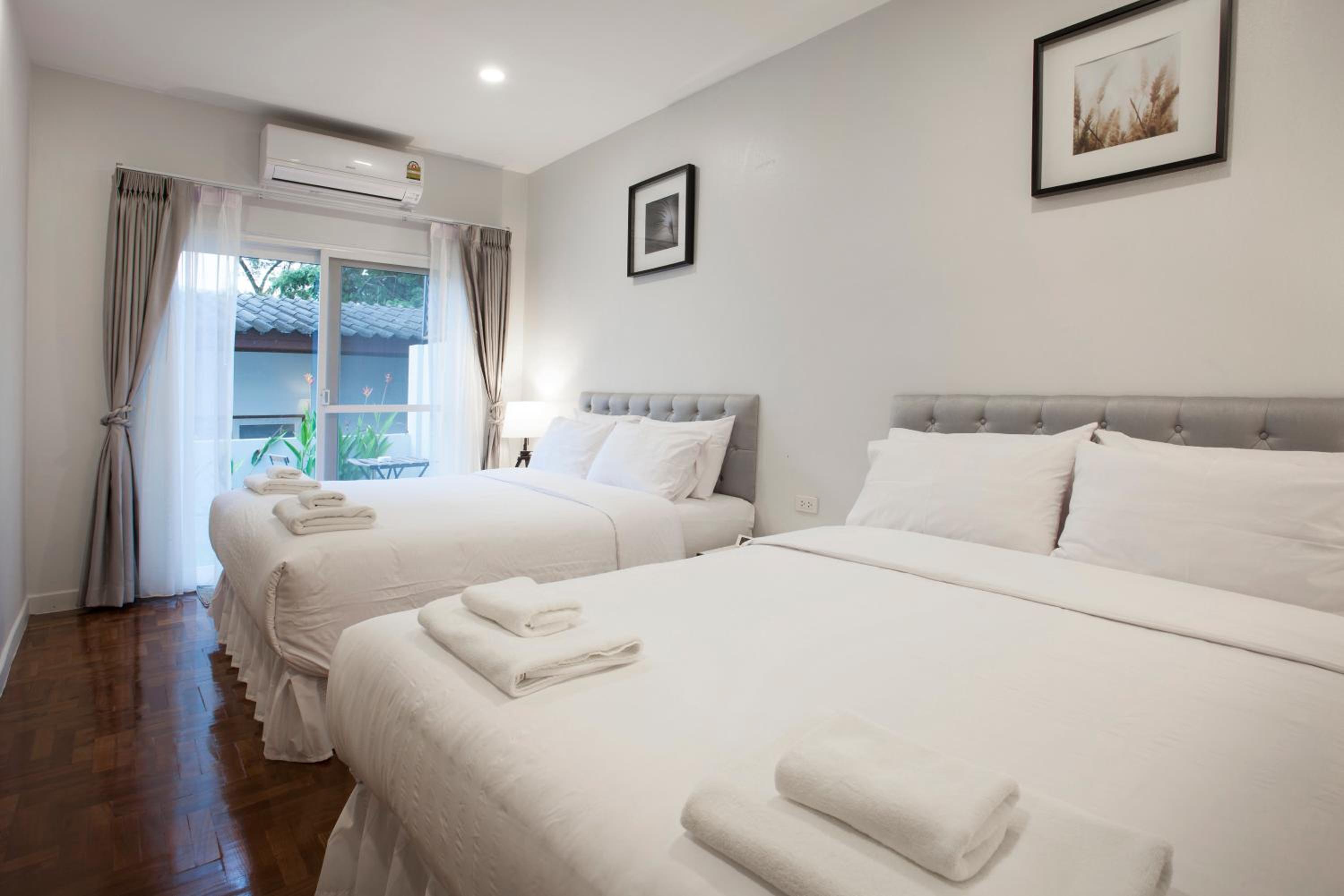 Deluxe Quadruple Room - Photo 8
