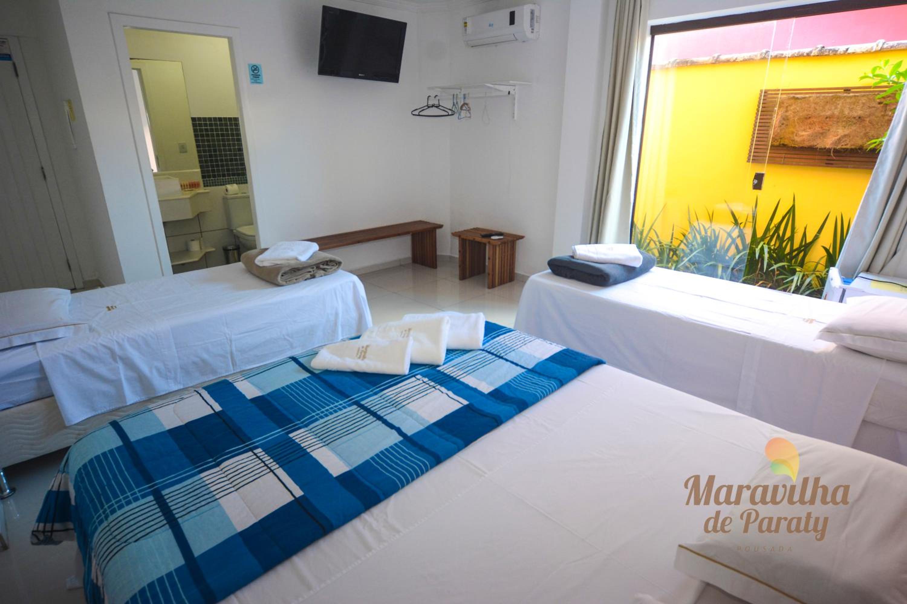 Standard Triple Room - Photo 7