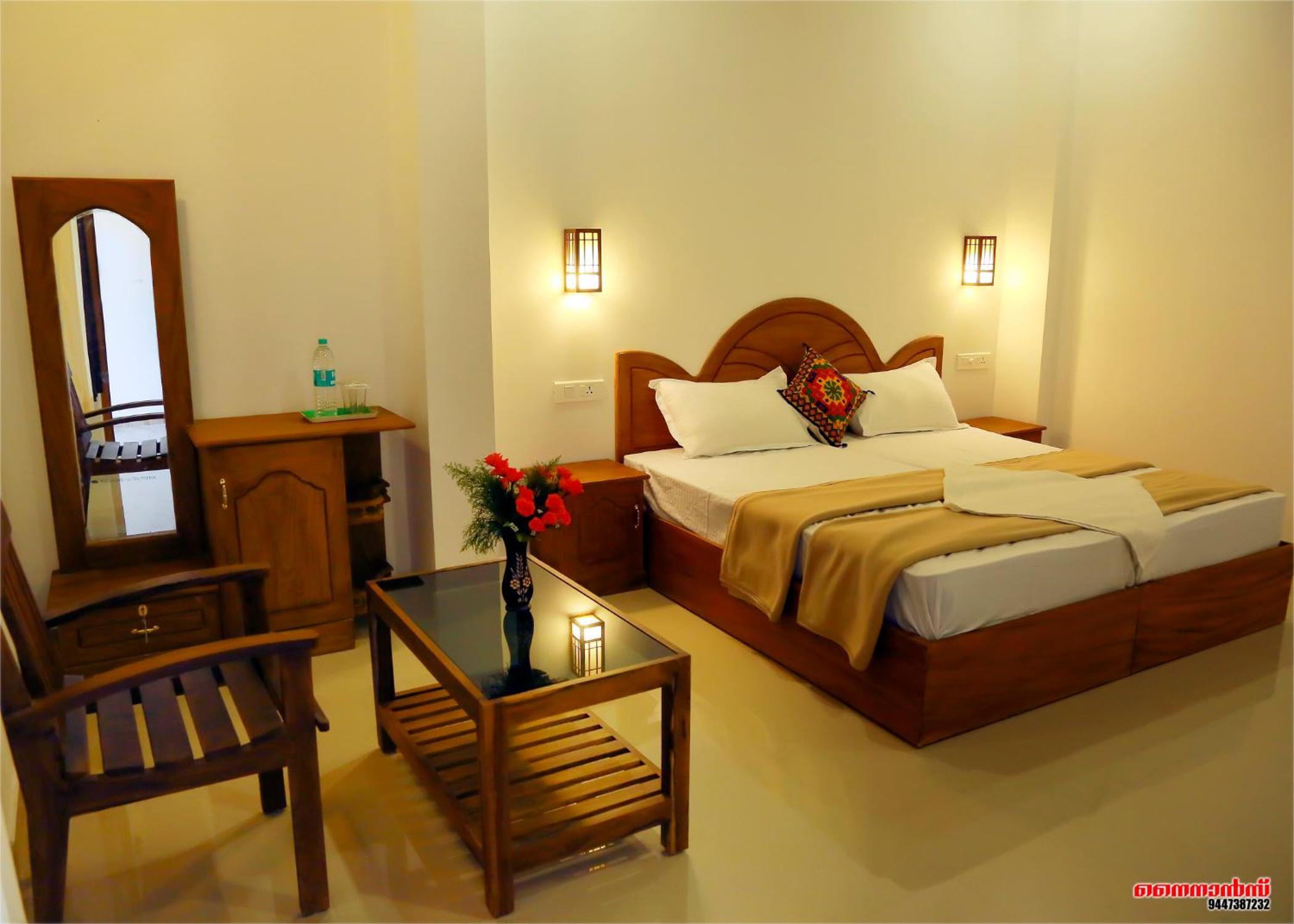 Deluxe Double Room (2 Adults + 1 Child) photo 2