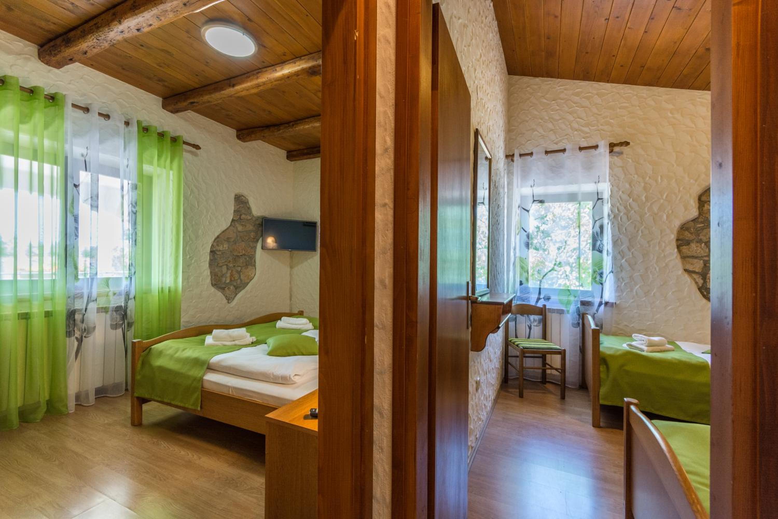Habitación Cuádruple con Balcón Compartido