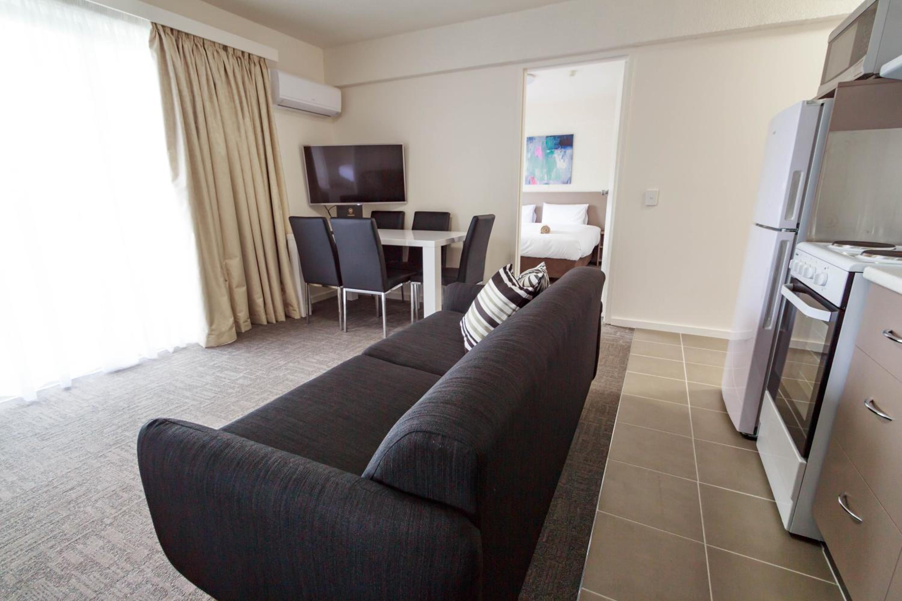 Three-Bedroom Apartment - Photo 10