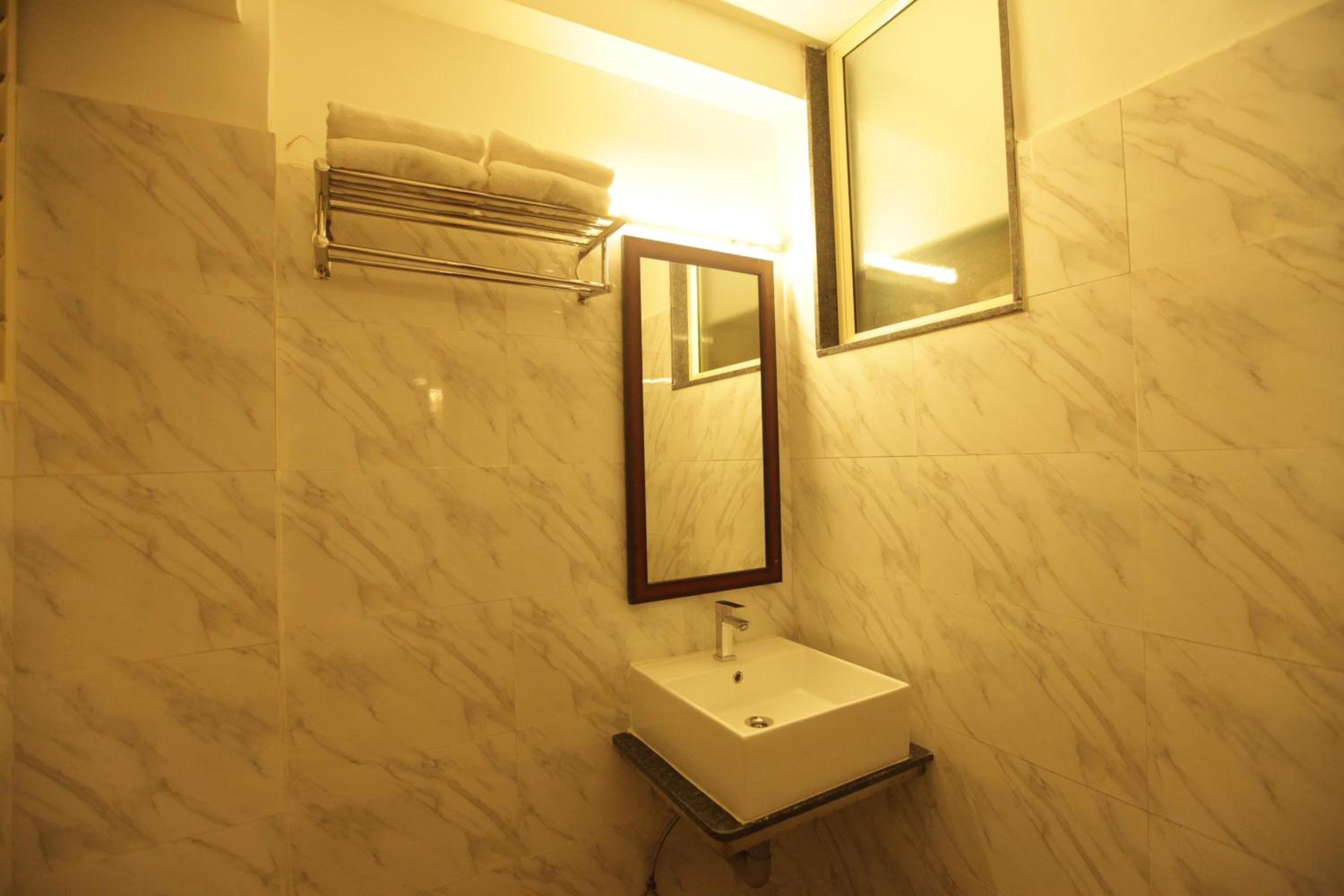 Deluxe Room - Photo 6