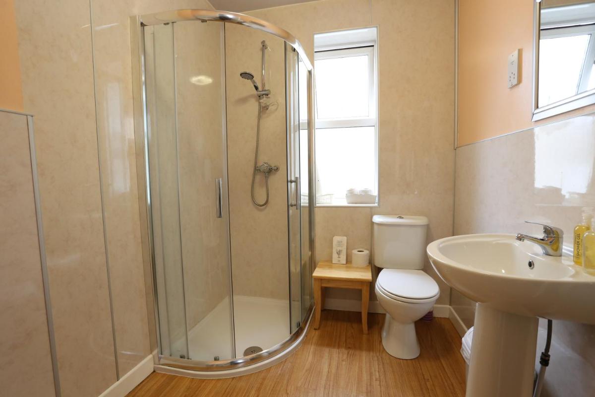 Single Room with Shared Shower and Toilet