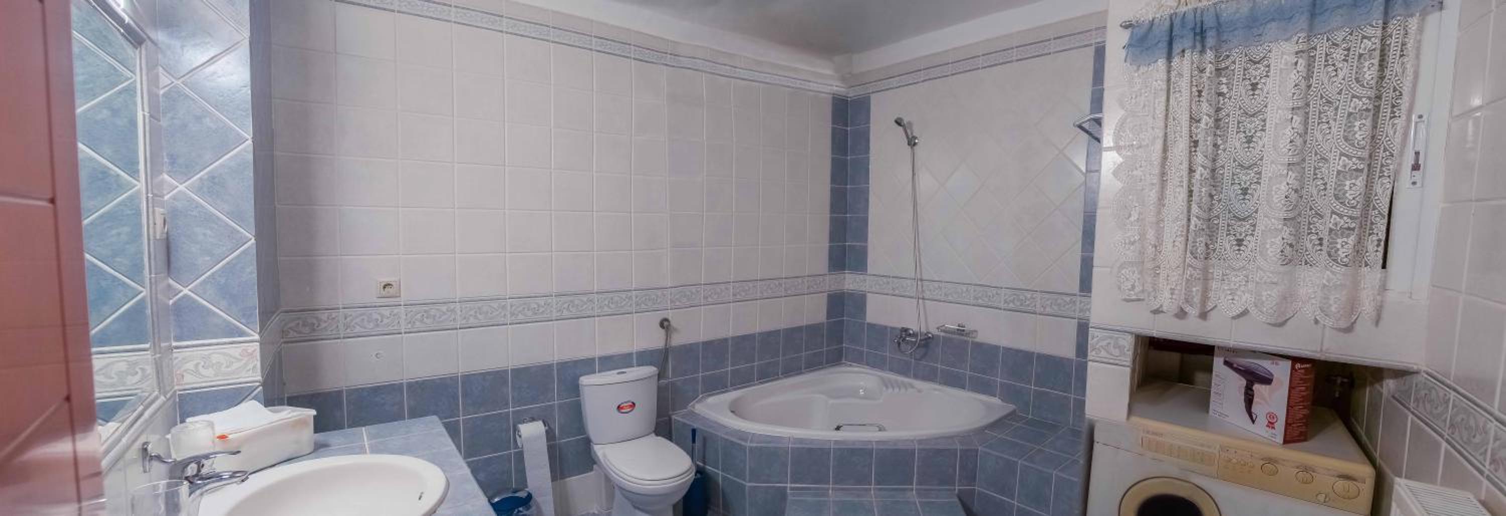 Three-Bedroom Apartment - Photo 5