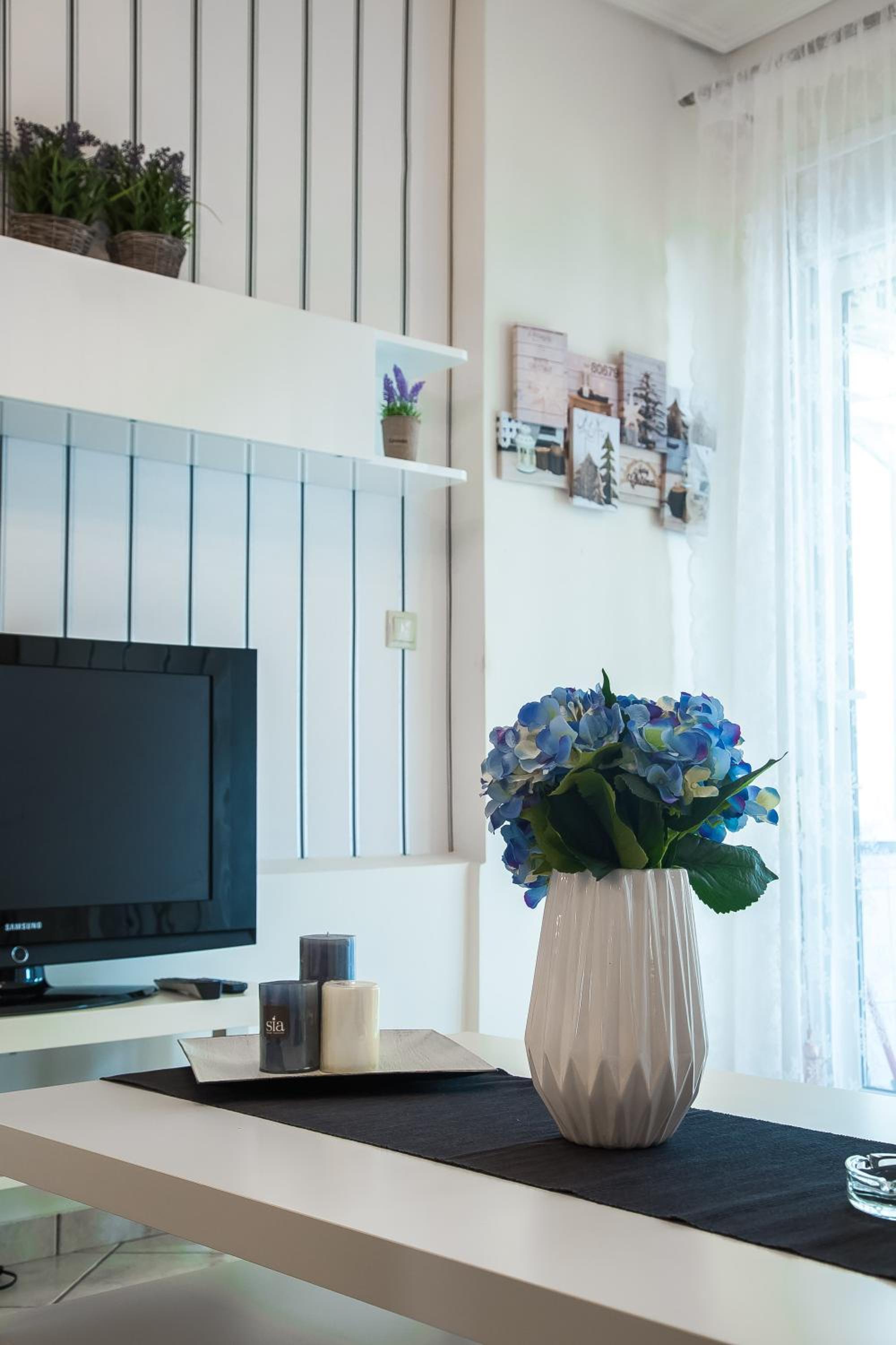 Three-Bedroom Apartment - Photo 2