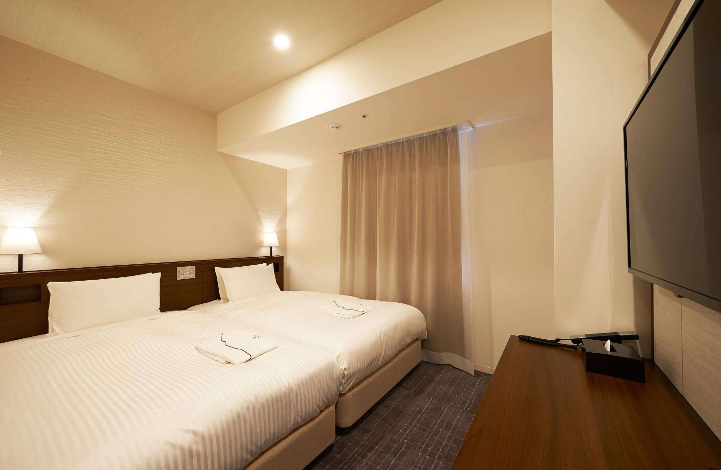 Twin Room - Non-Smoking photo 1
