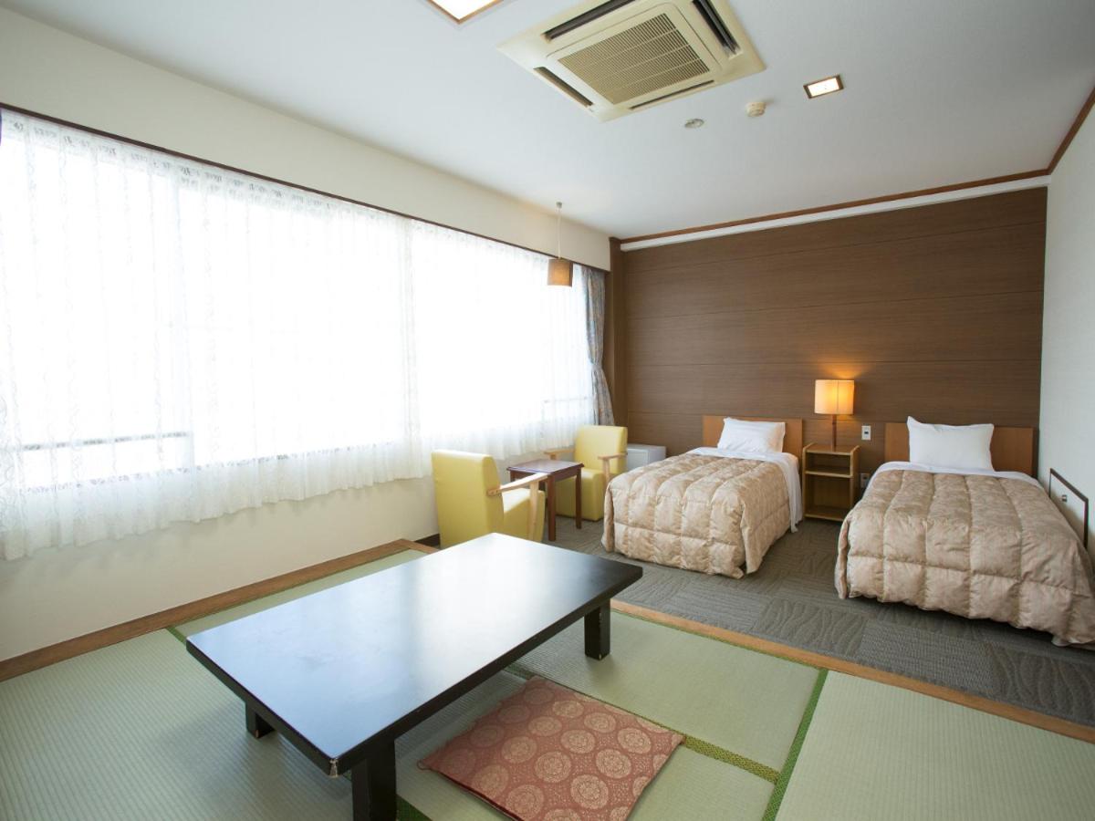 Quadruple Room With Tatami Area - Non-Smoking photo 1
