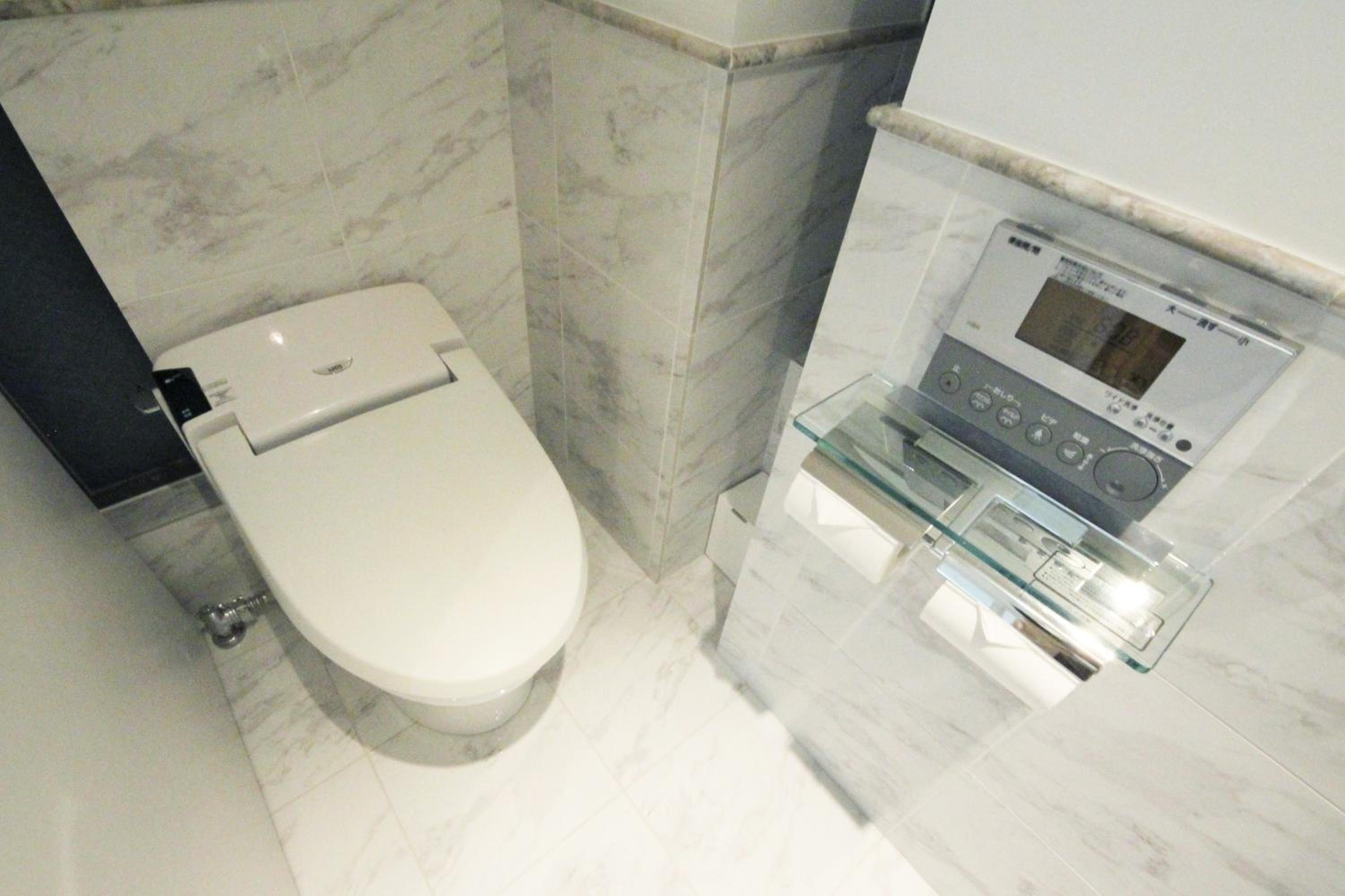 Three-Bedroom House - Photo 28