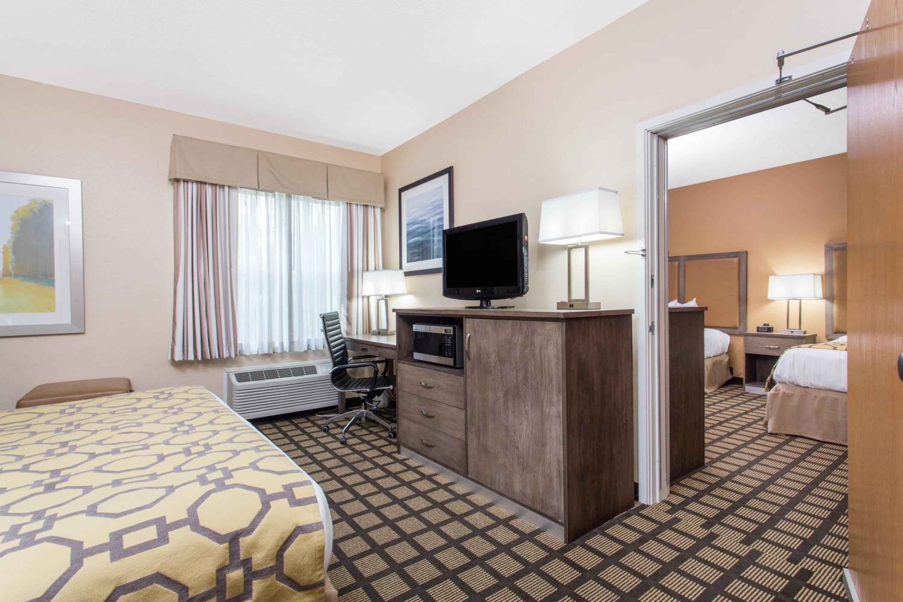 Family Two-Bedroom Suite with 1 King Bed and 2 Doubles Beds, Non-Smoking - Photo 1