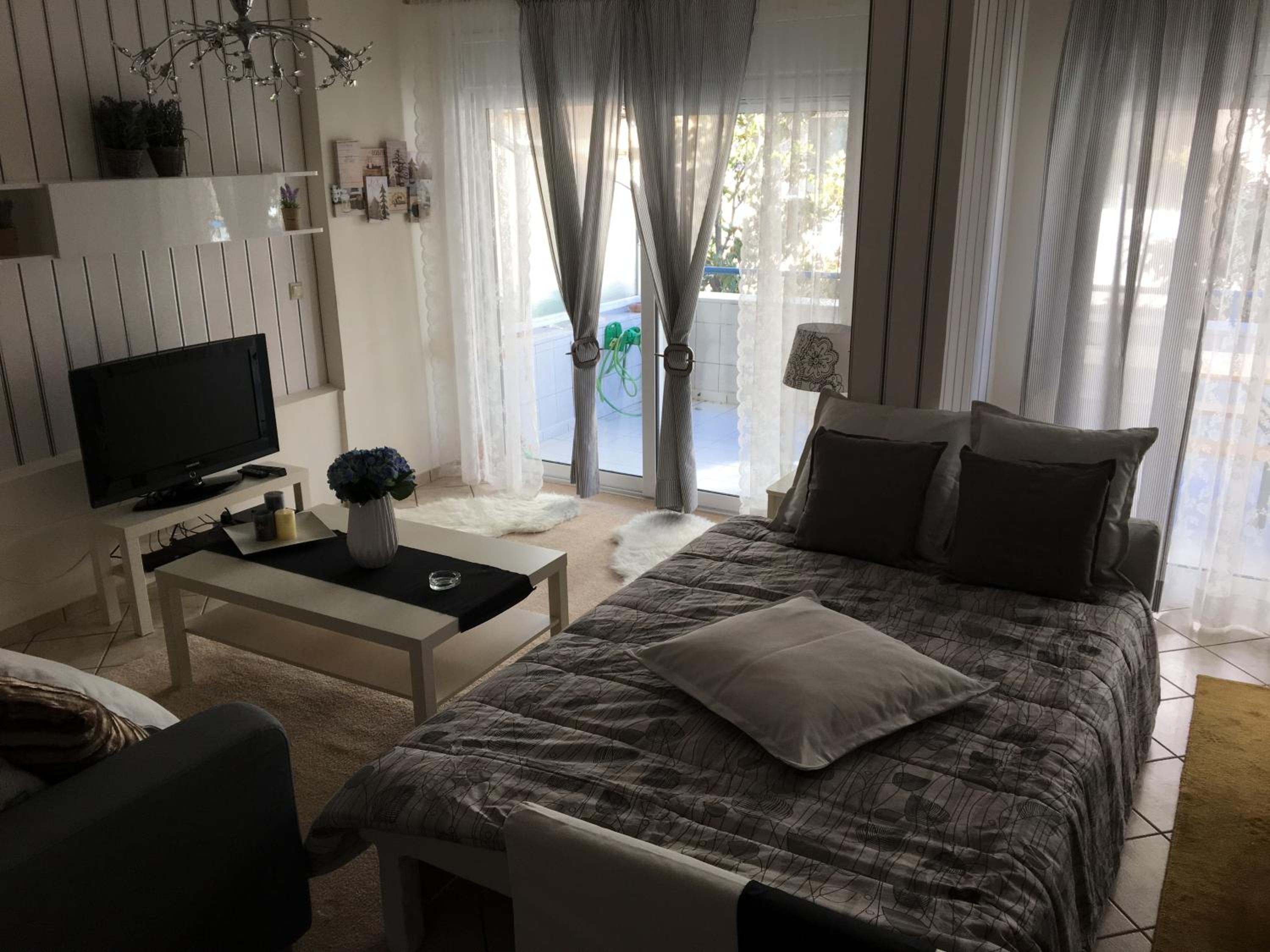 Three-Bedroom Apartment - Photo 25