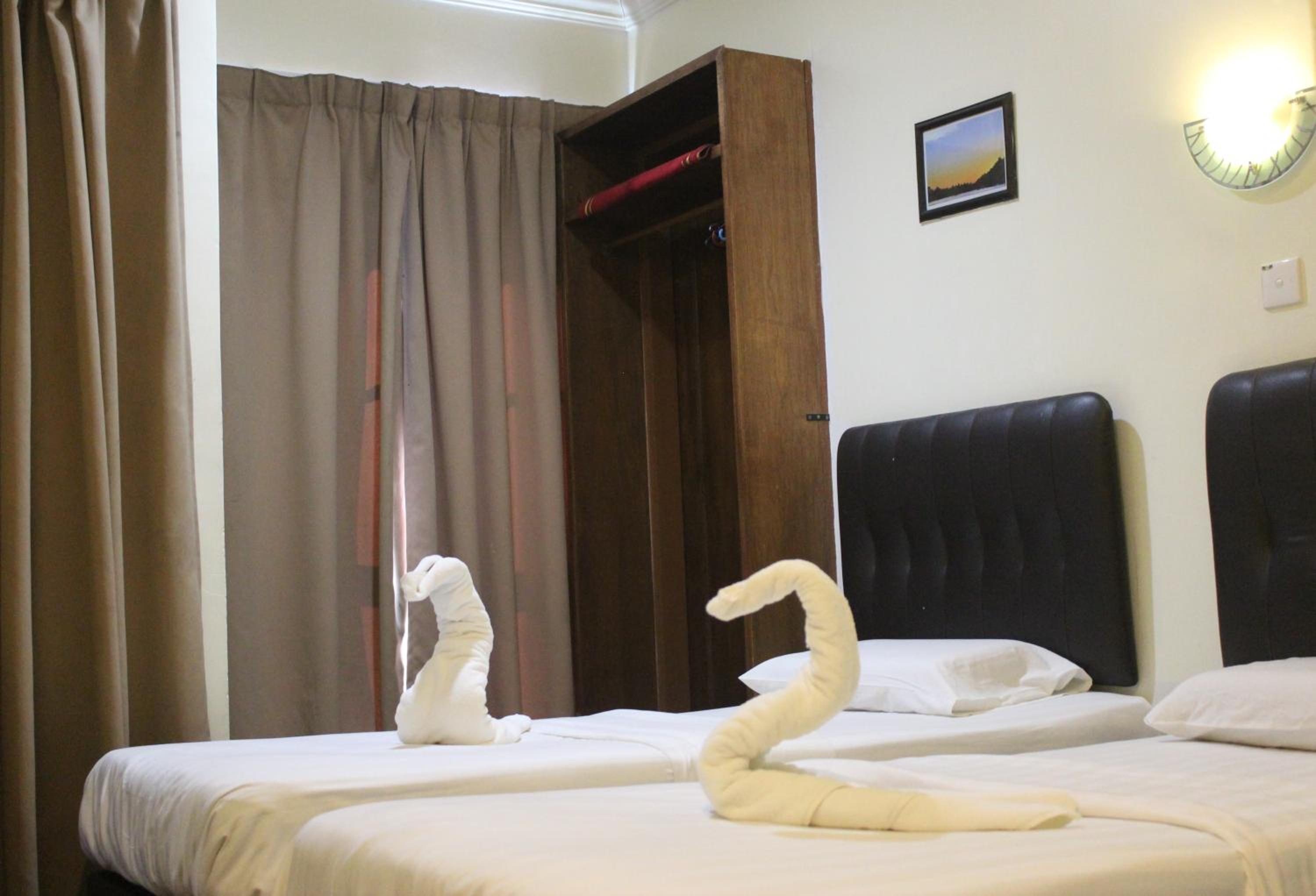 Standard Twin Room - Photo 6