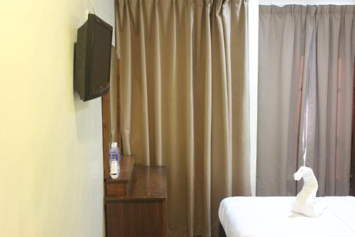 Standard Twin Room - Photo 4