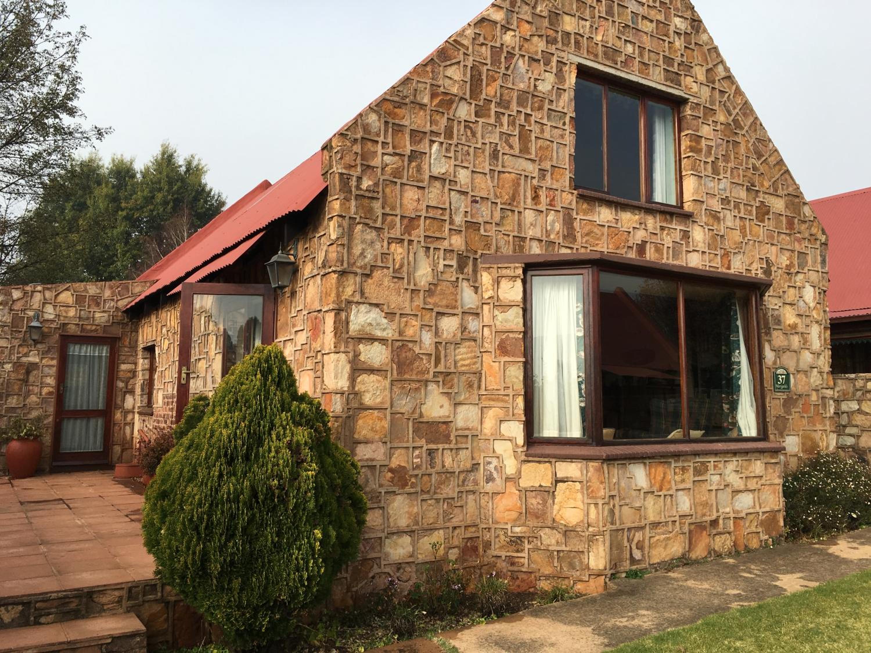 Three-Bedroom House - Photo 28