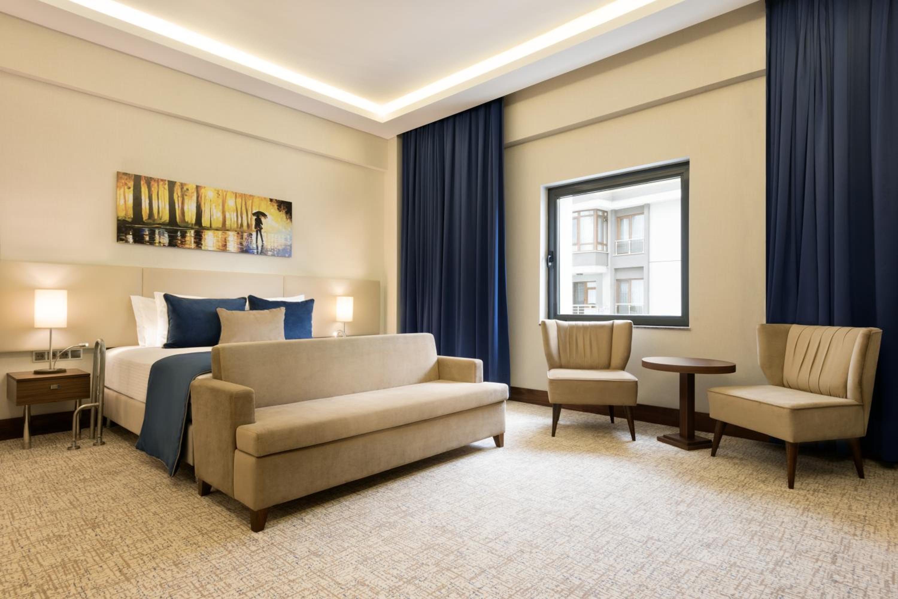 Chambre Lit King-Size Deluxe - Non-Fumeurs