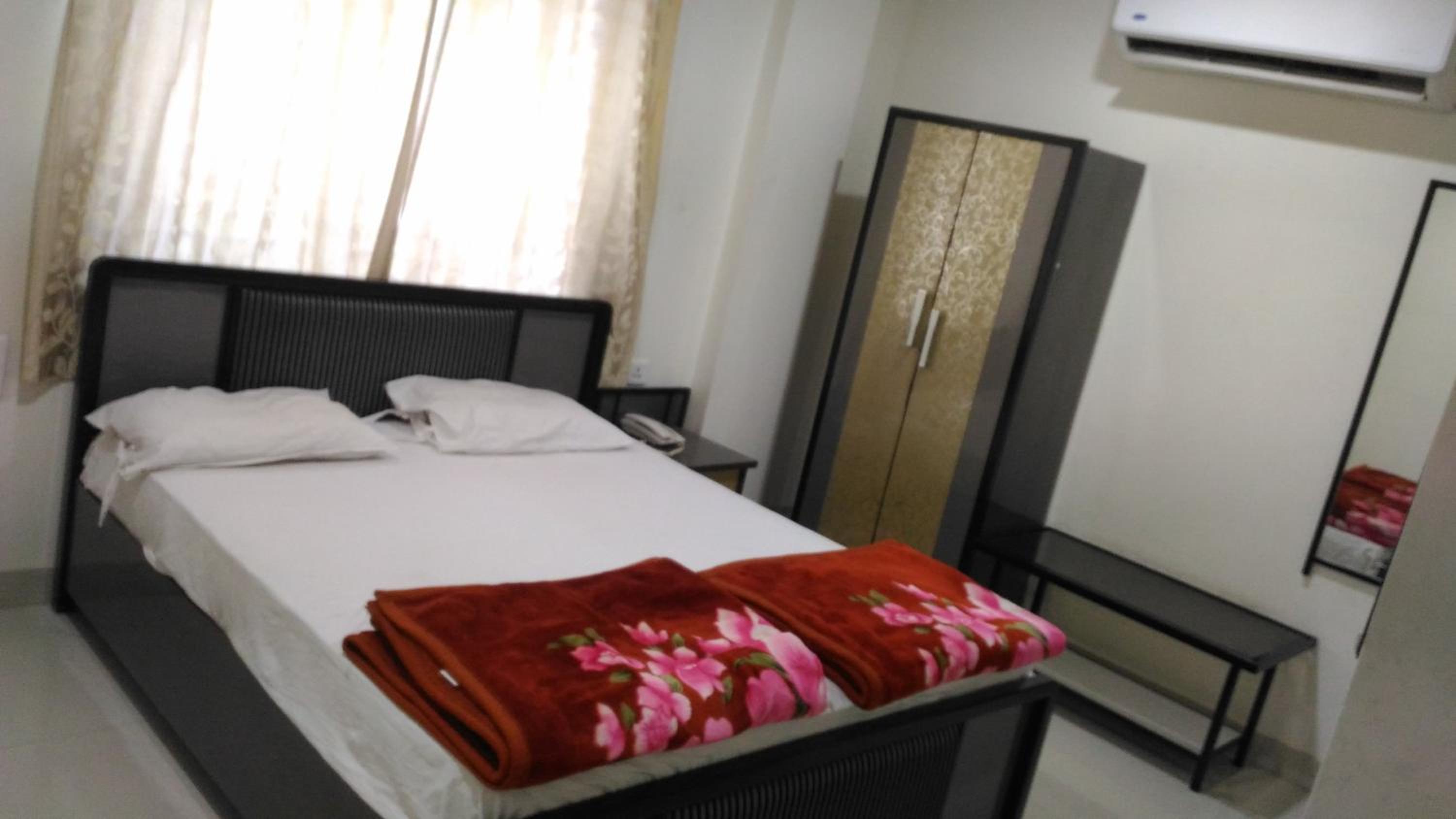 Deluxe Double Room with AC photo 2