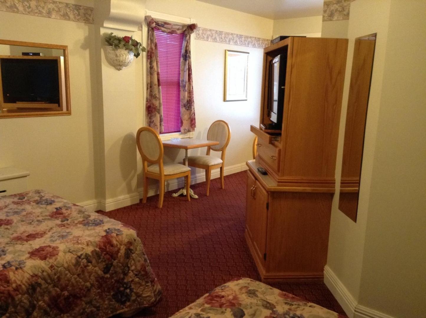 Superior Queen Room with Two Queen Beds - Photo 1