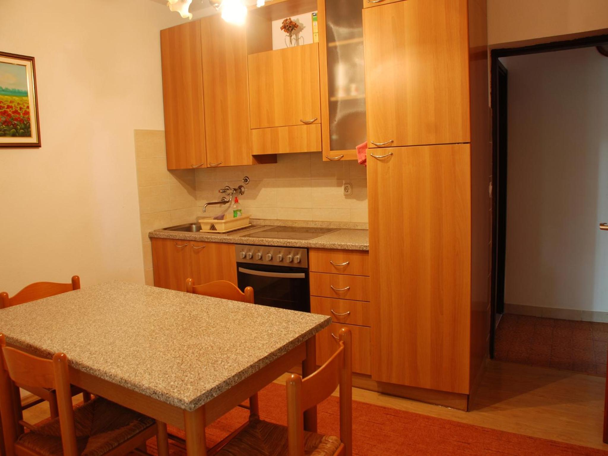 Apartment with Balcony - Photo 5