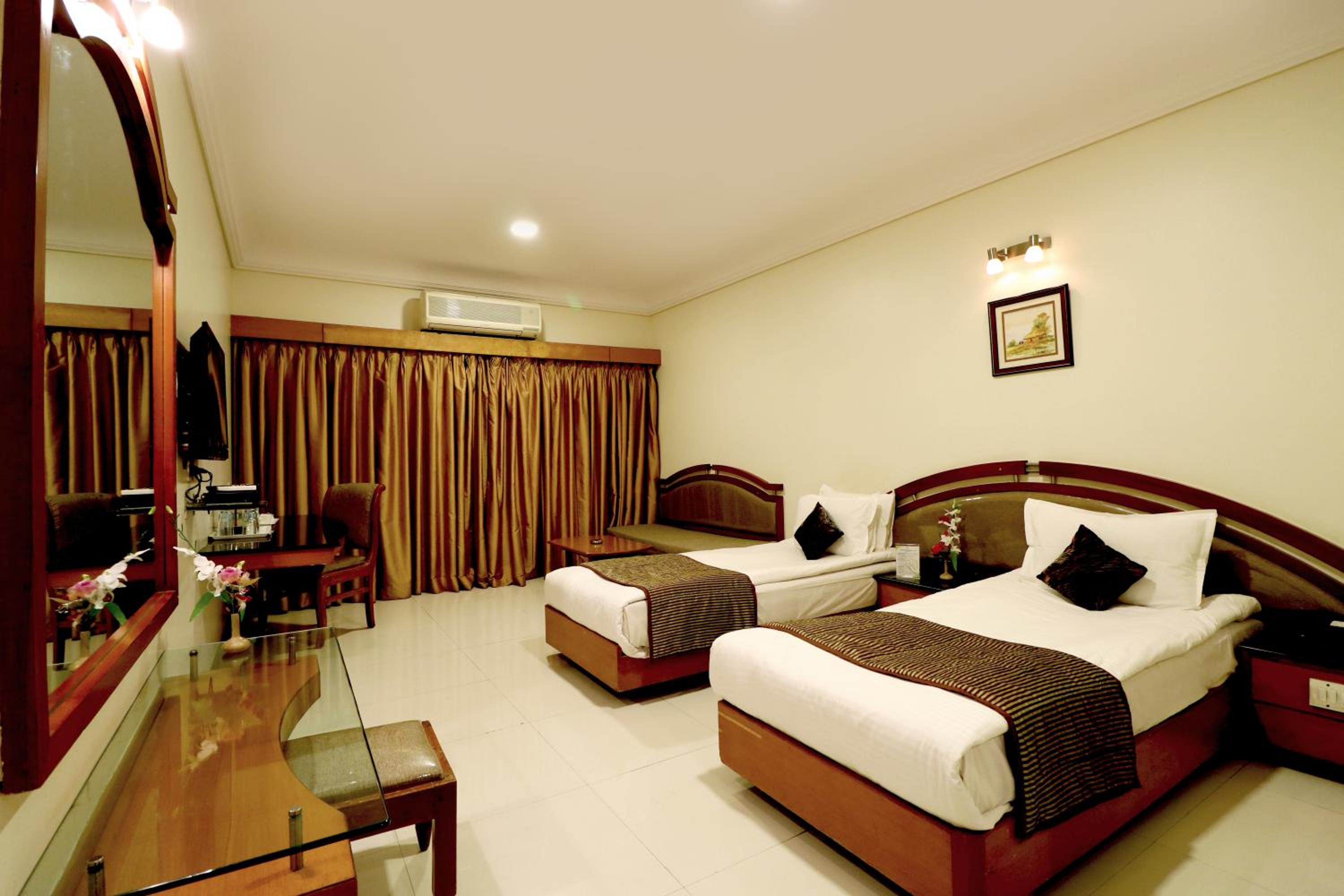 Deluxe Room - Photo 10