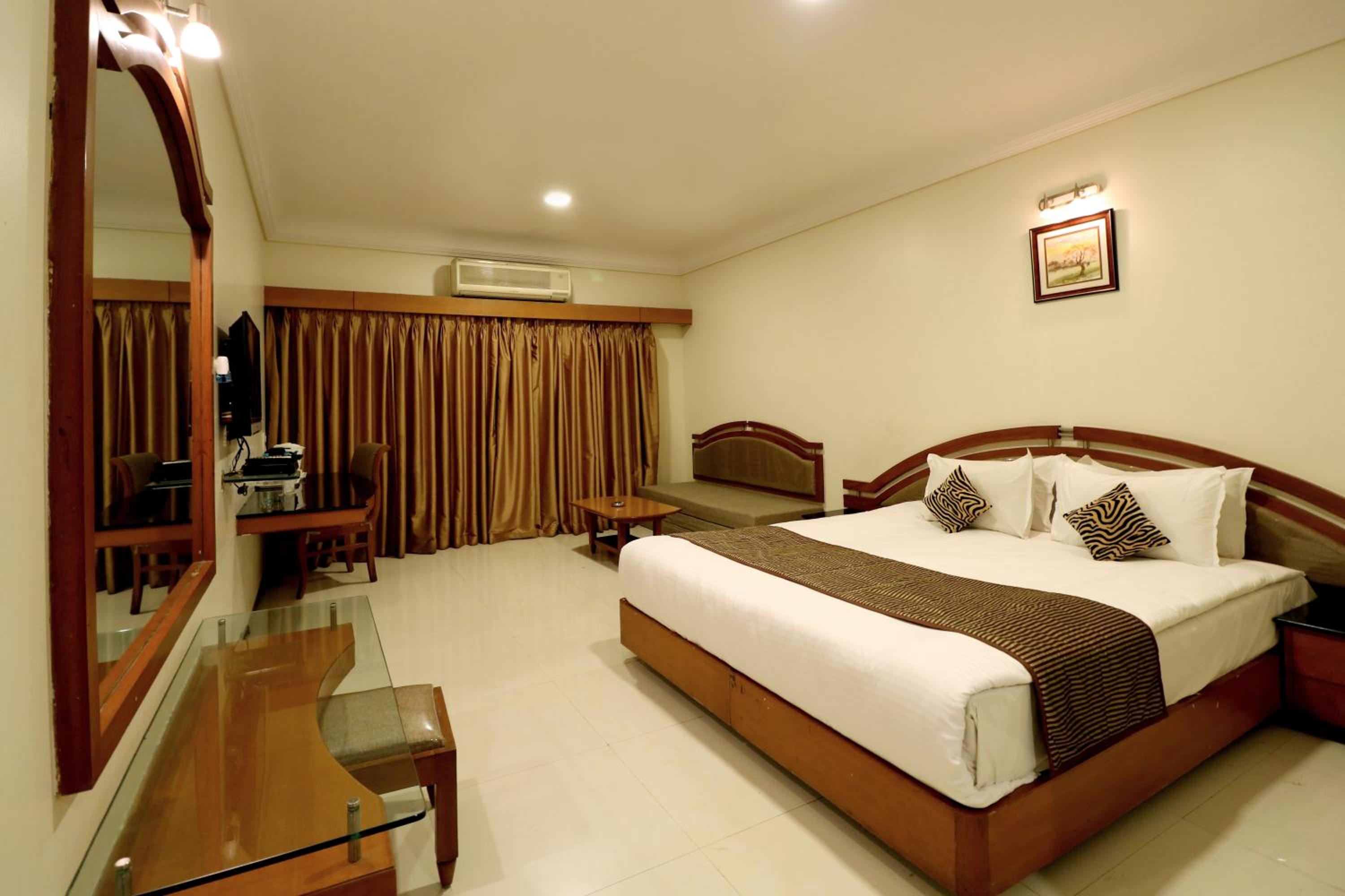 Deluxe Room - Photo 1