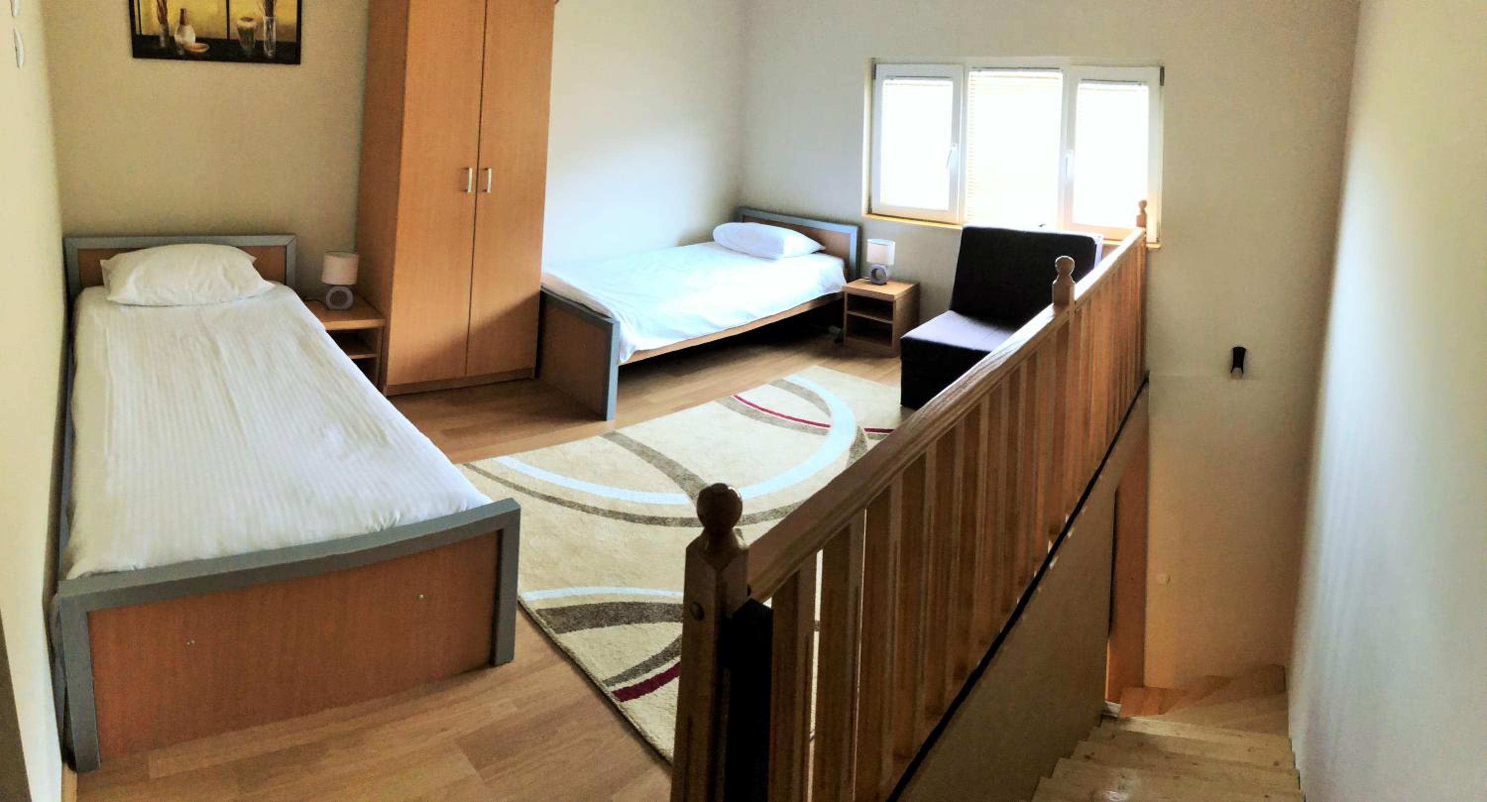 Three-Bedroom Apartment - Photo 12