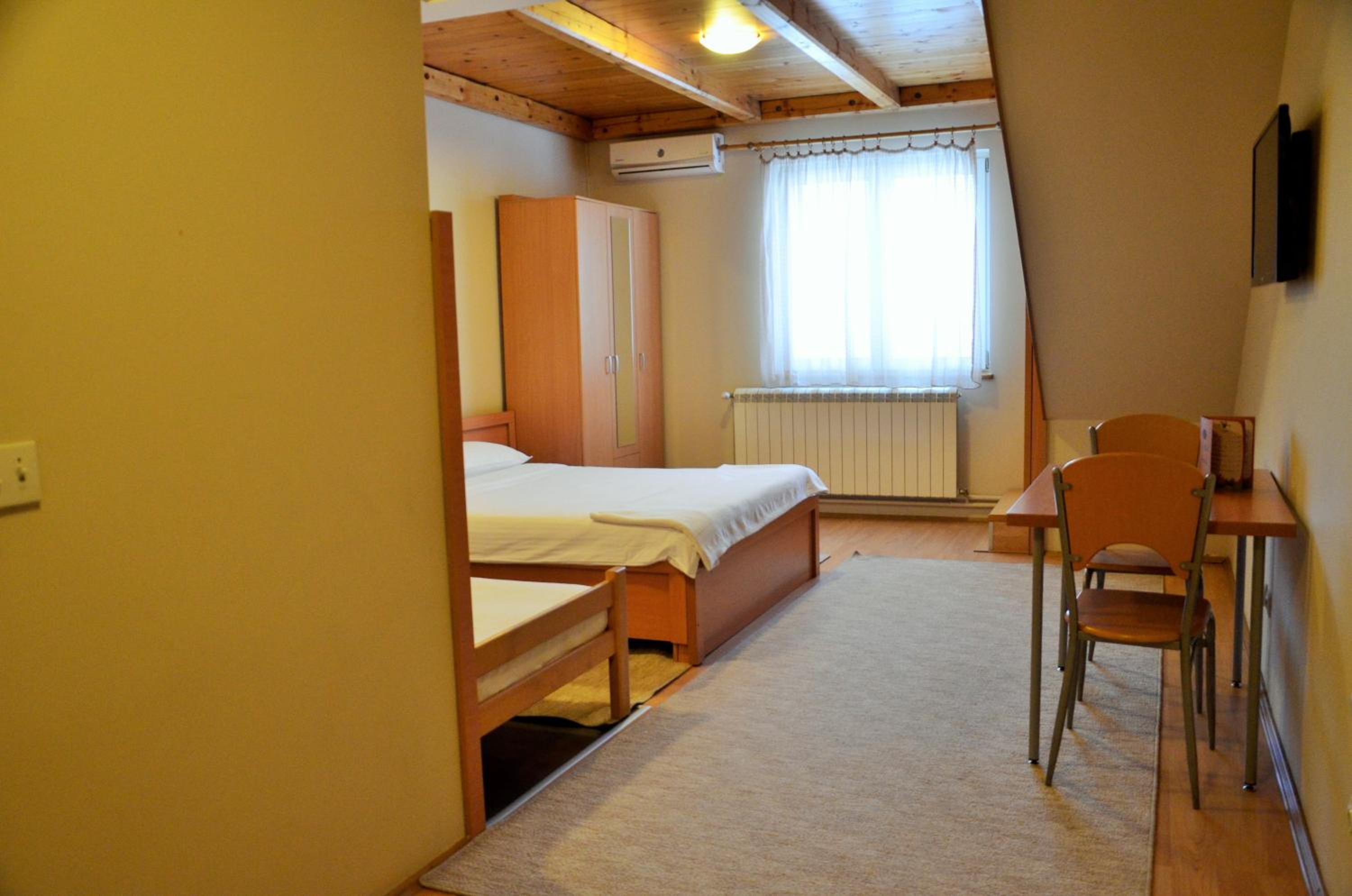 Three-Bedroom Apartment - Photo 3