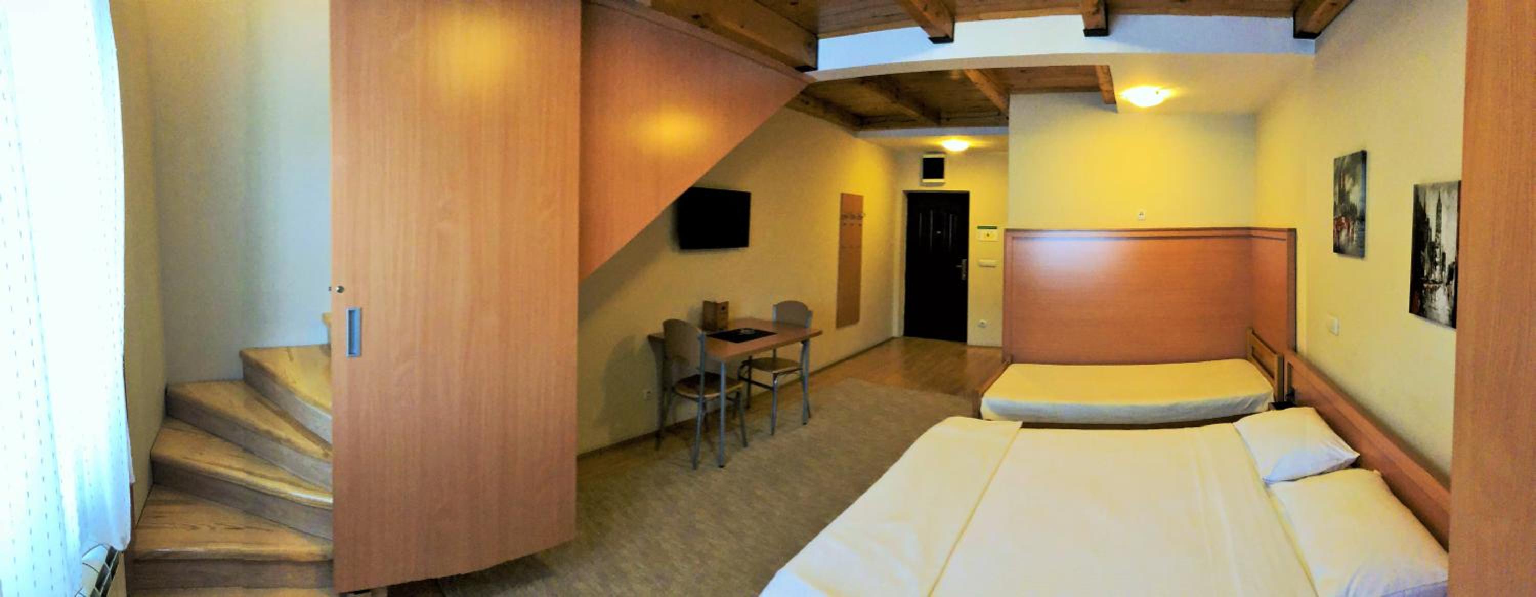 Three-Bedroom Apartment - Photo 9