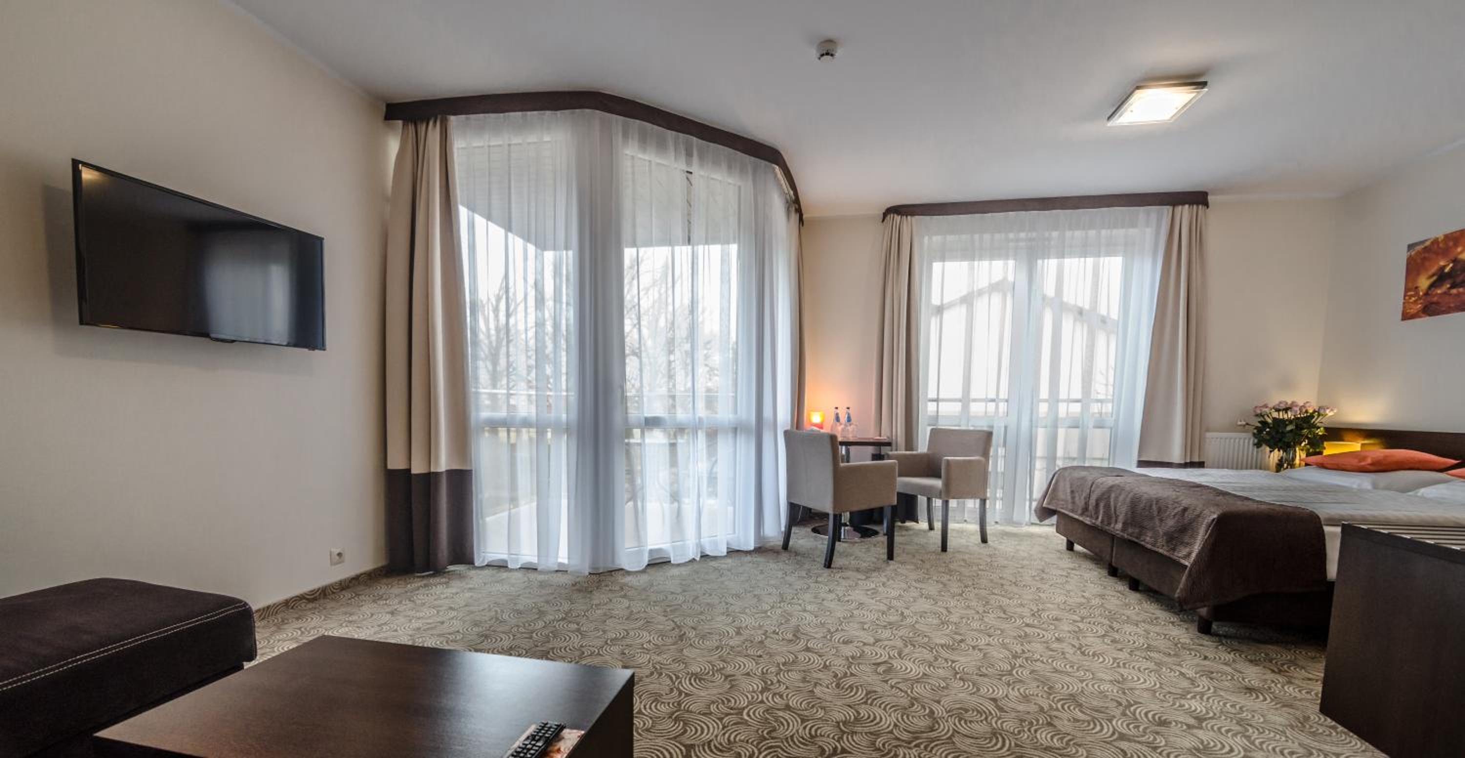 Family Room with Balcony and Partial Lake View photo 3