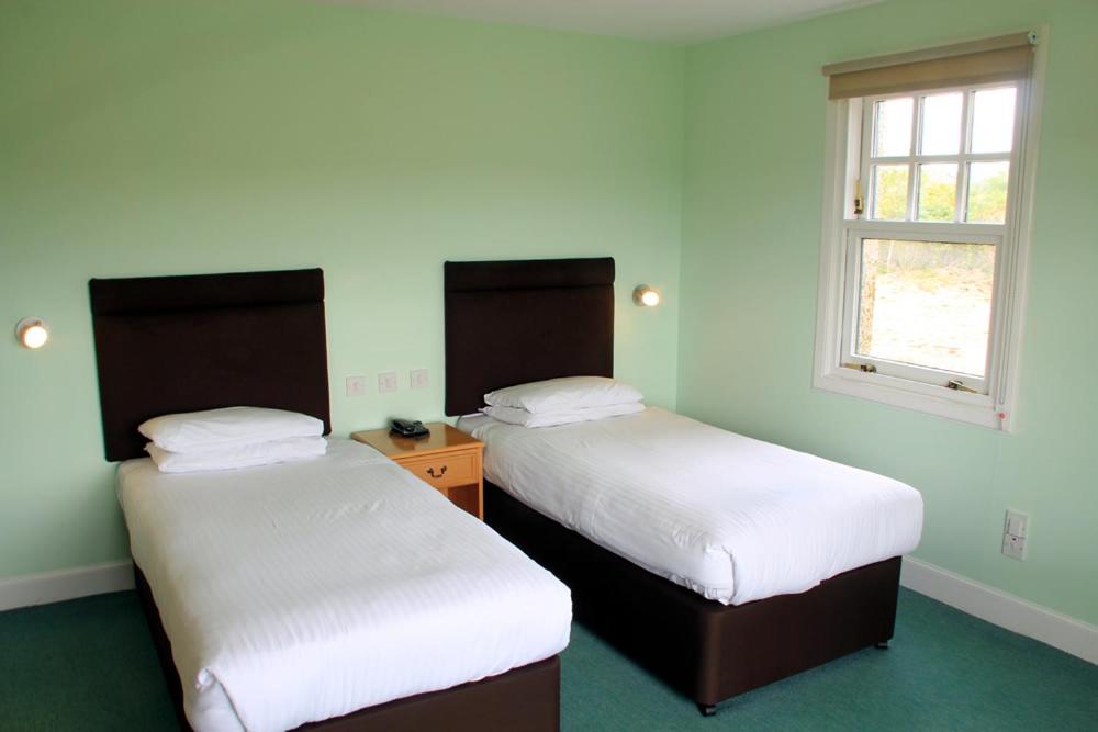 Twin Room - Photo 1