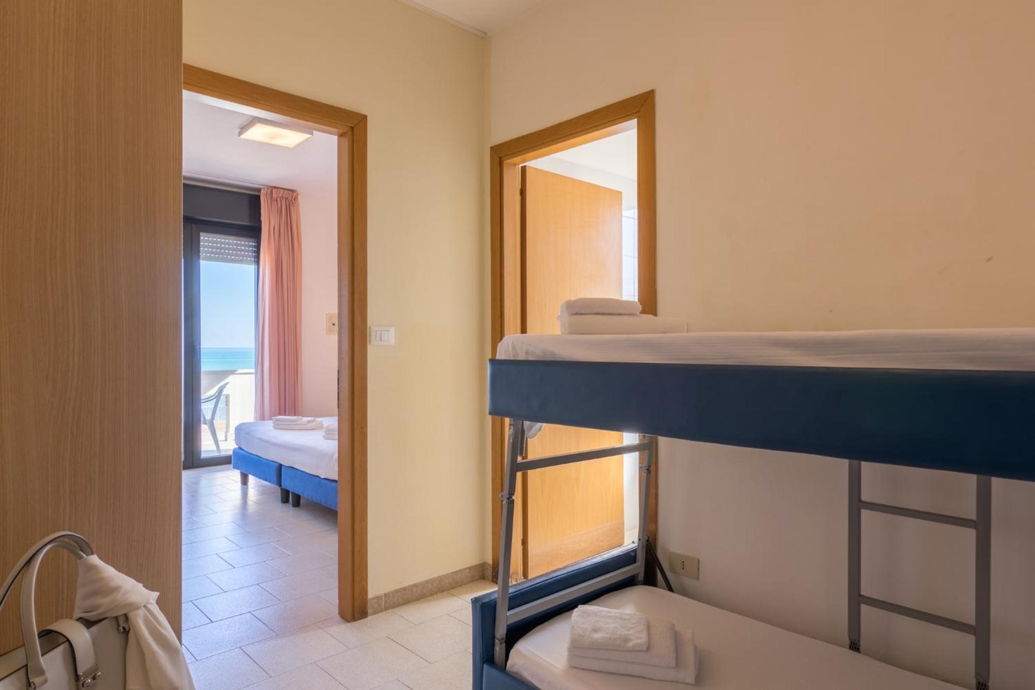 Quadruple Room with Balcony photo 3