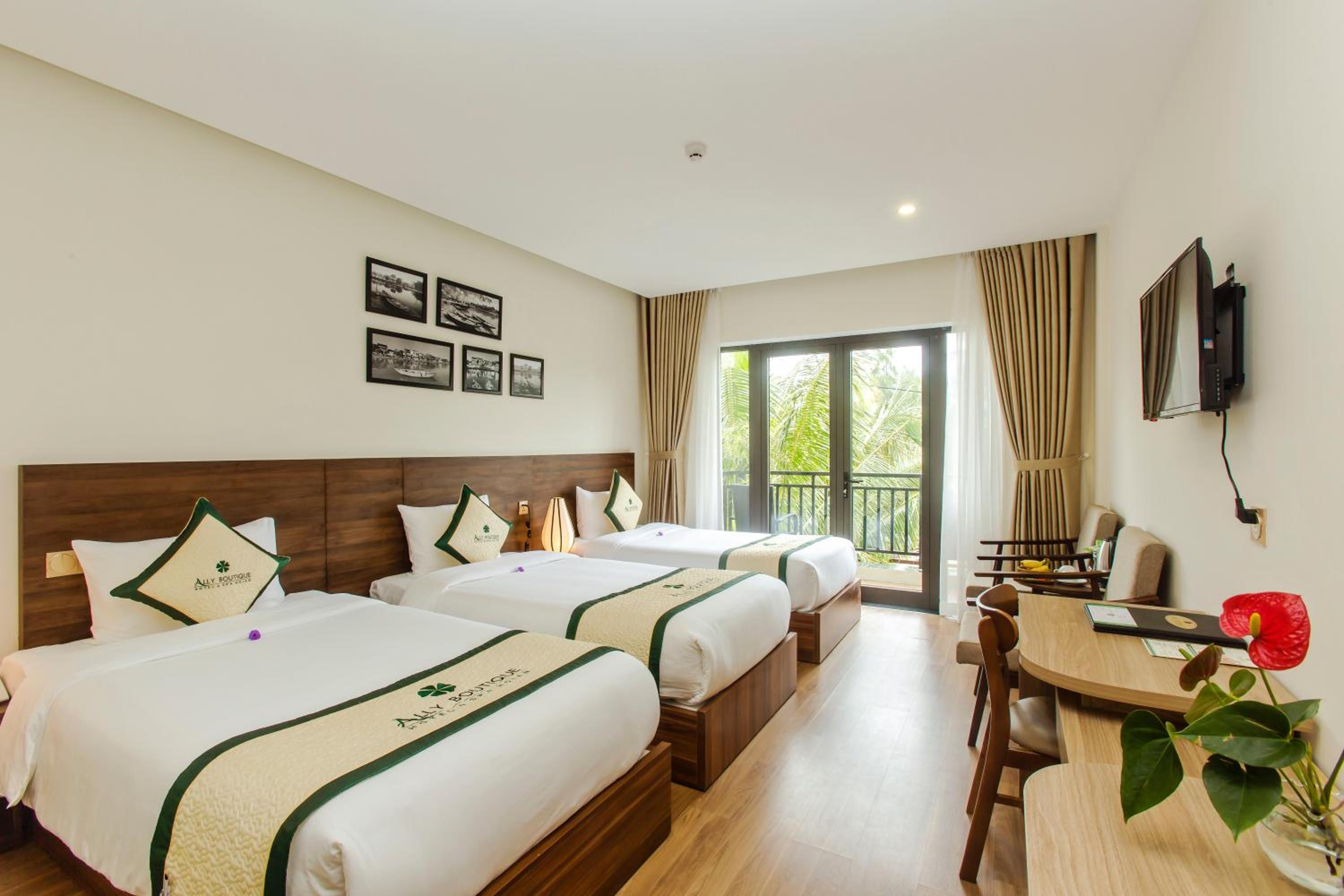 Deluxe Triple Room - Photo 1
