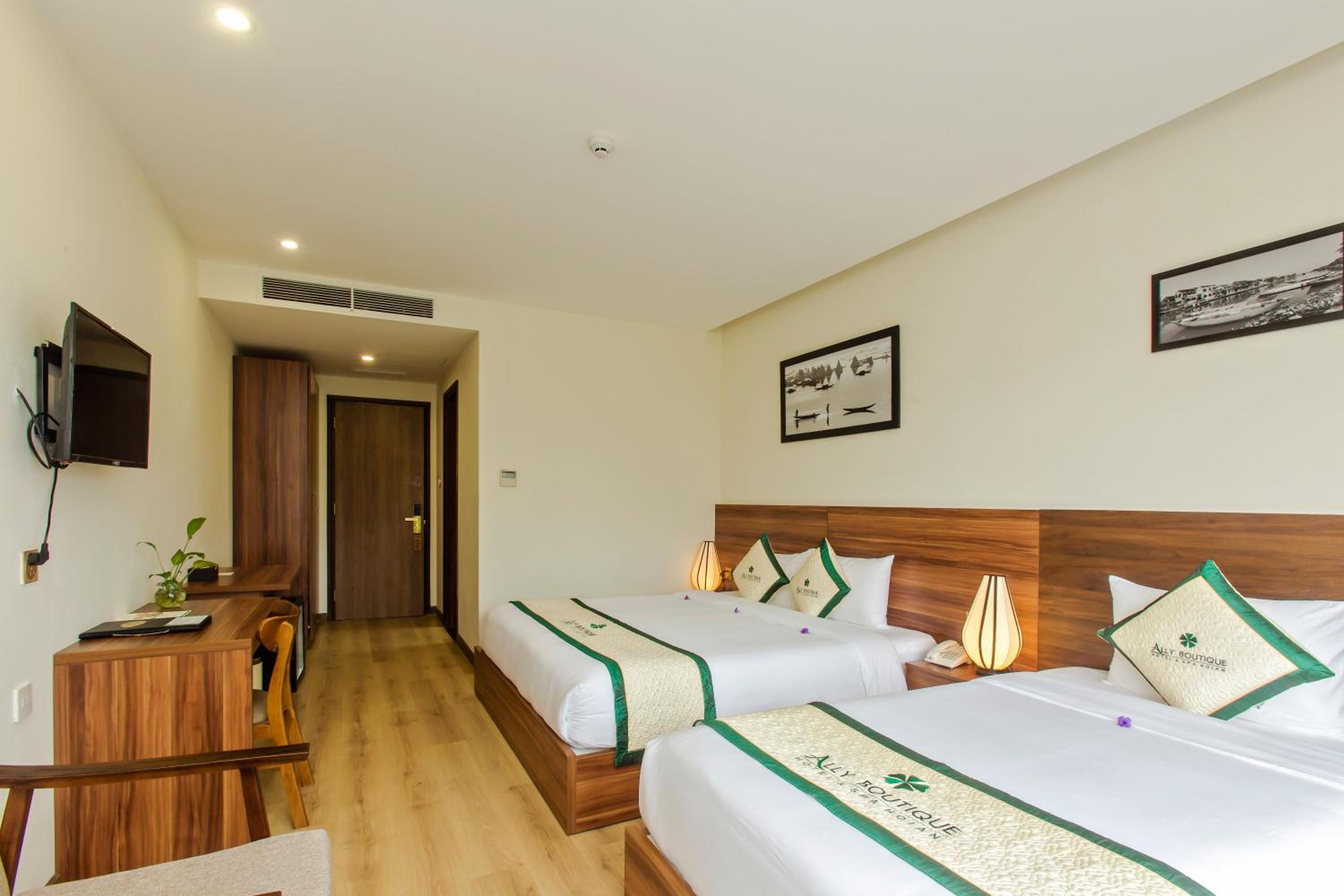 Deluxe Triple Room - Photo 8