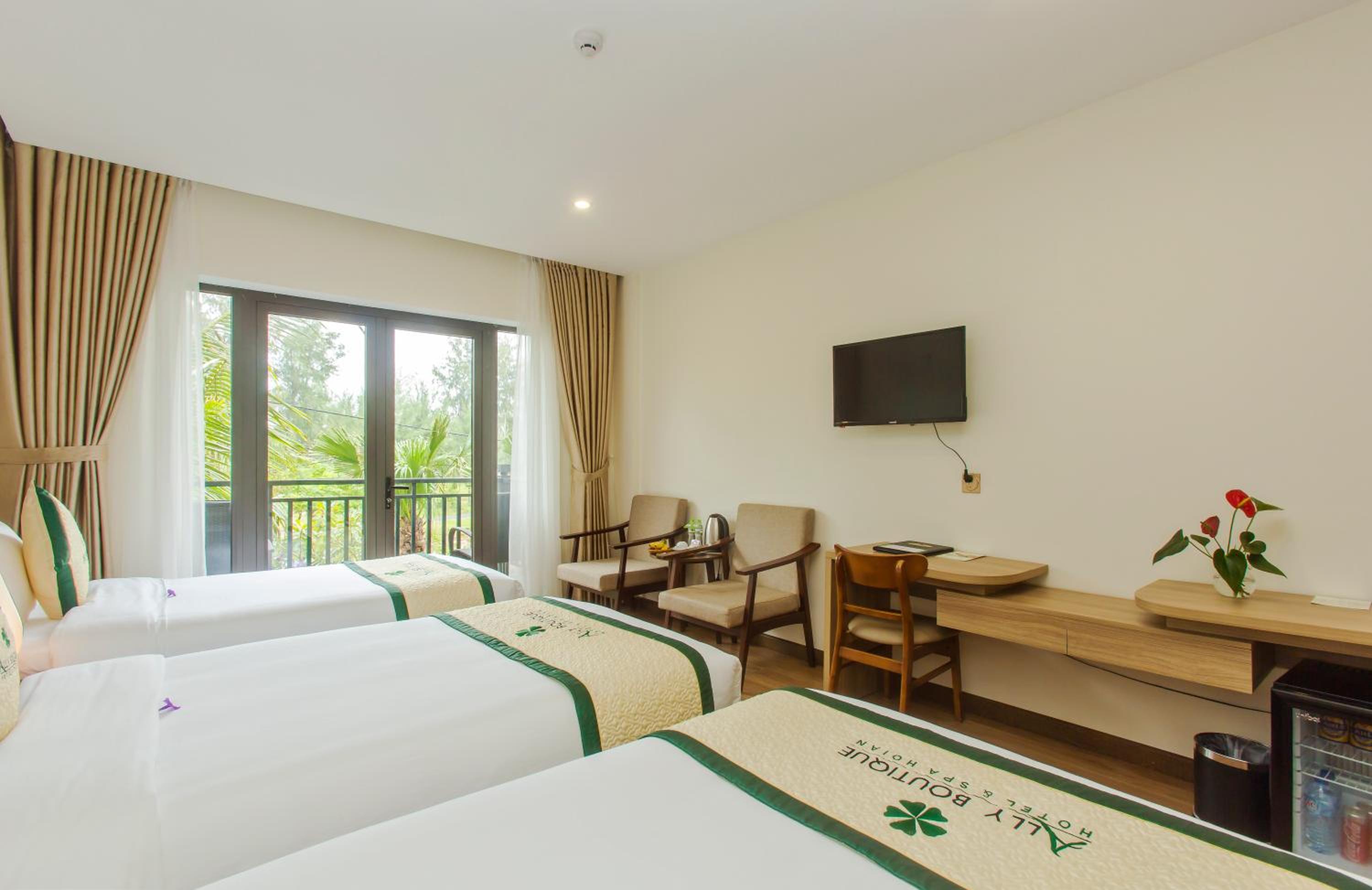 Deluxe Triple Room - Photo 5