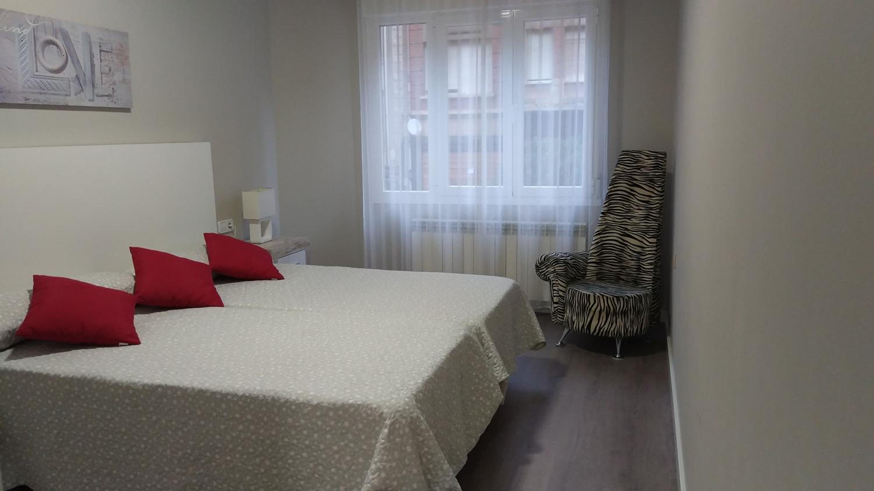Three-Bedroom Apartment - Photo 41