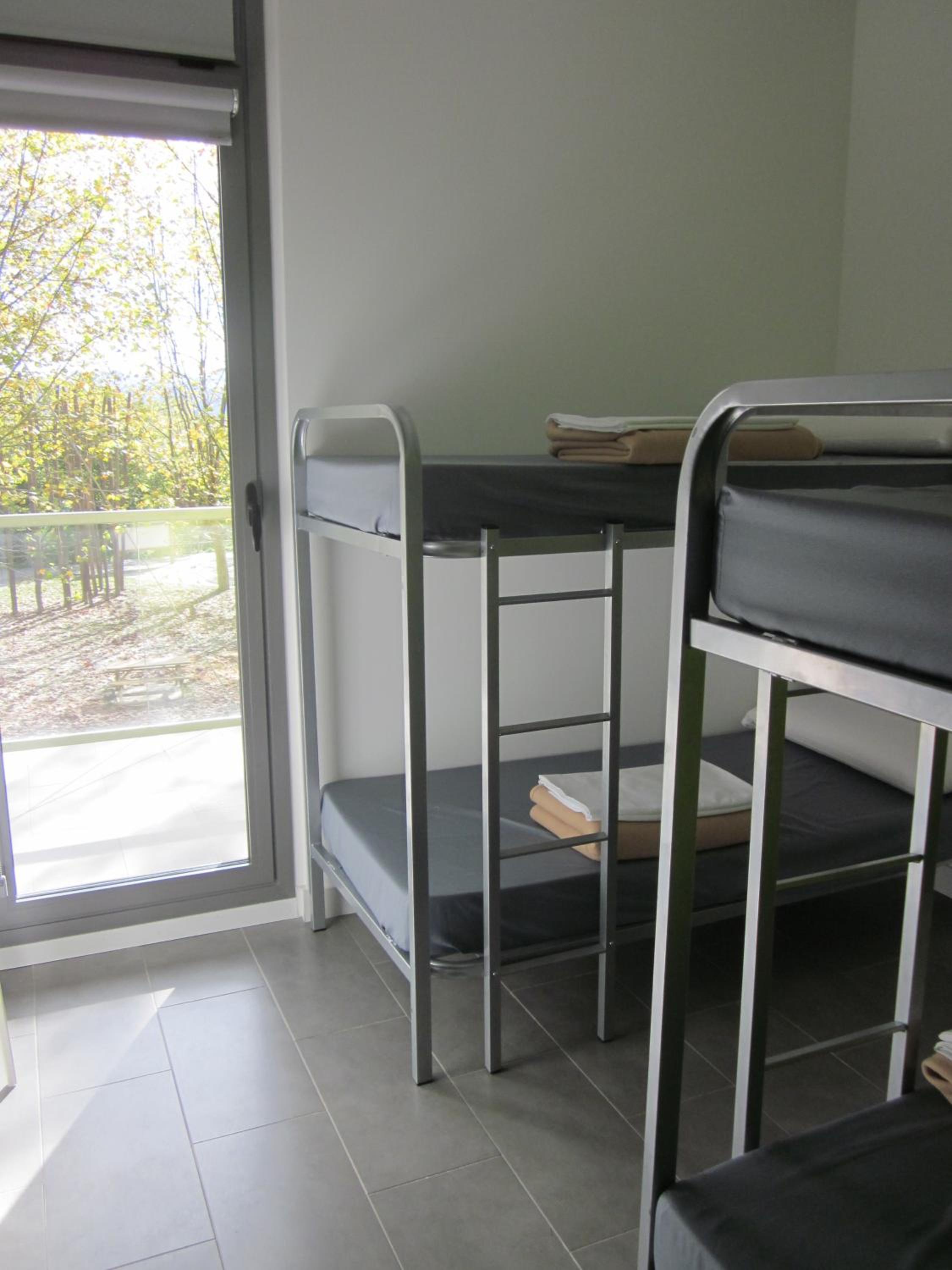Cama en habitación compartida de 4 camas