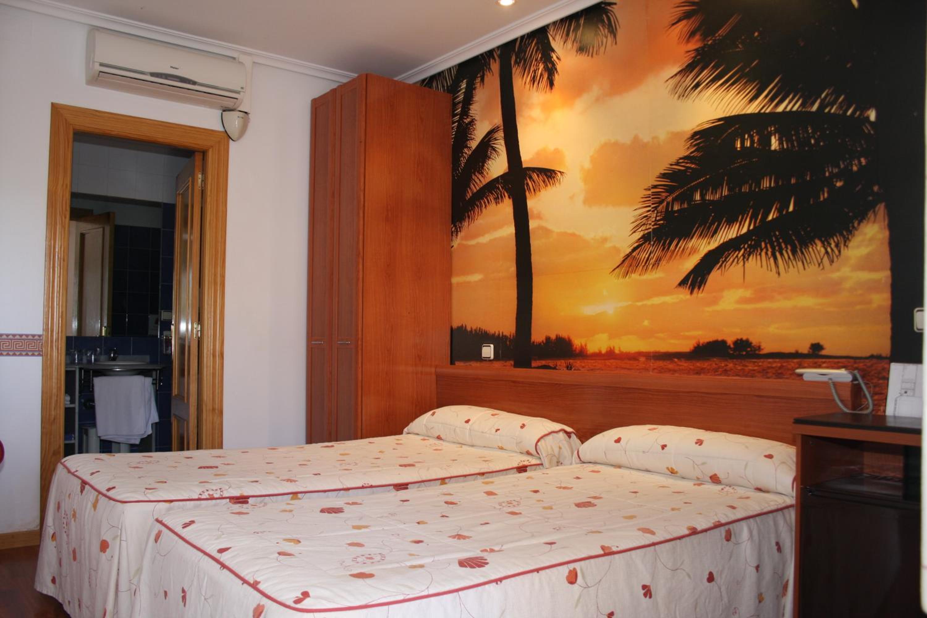 Habitación familiar (2 adultos + 1 niño)
