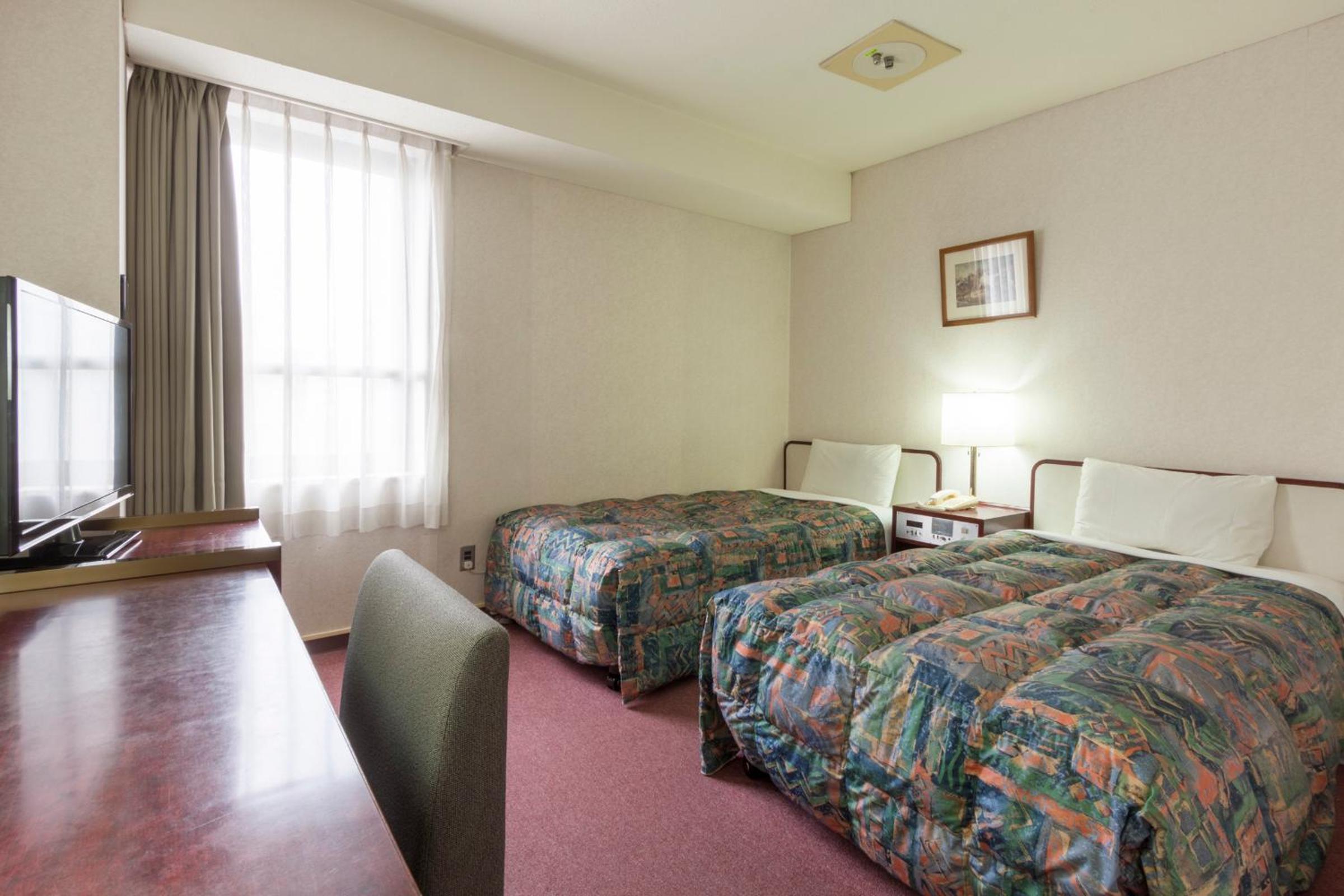 Twin Room - Non-Smoking - Photo 5