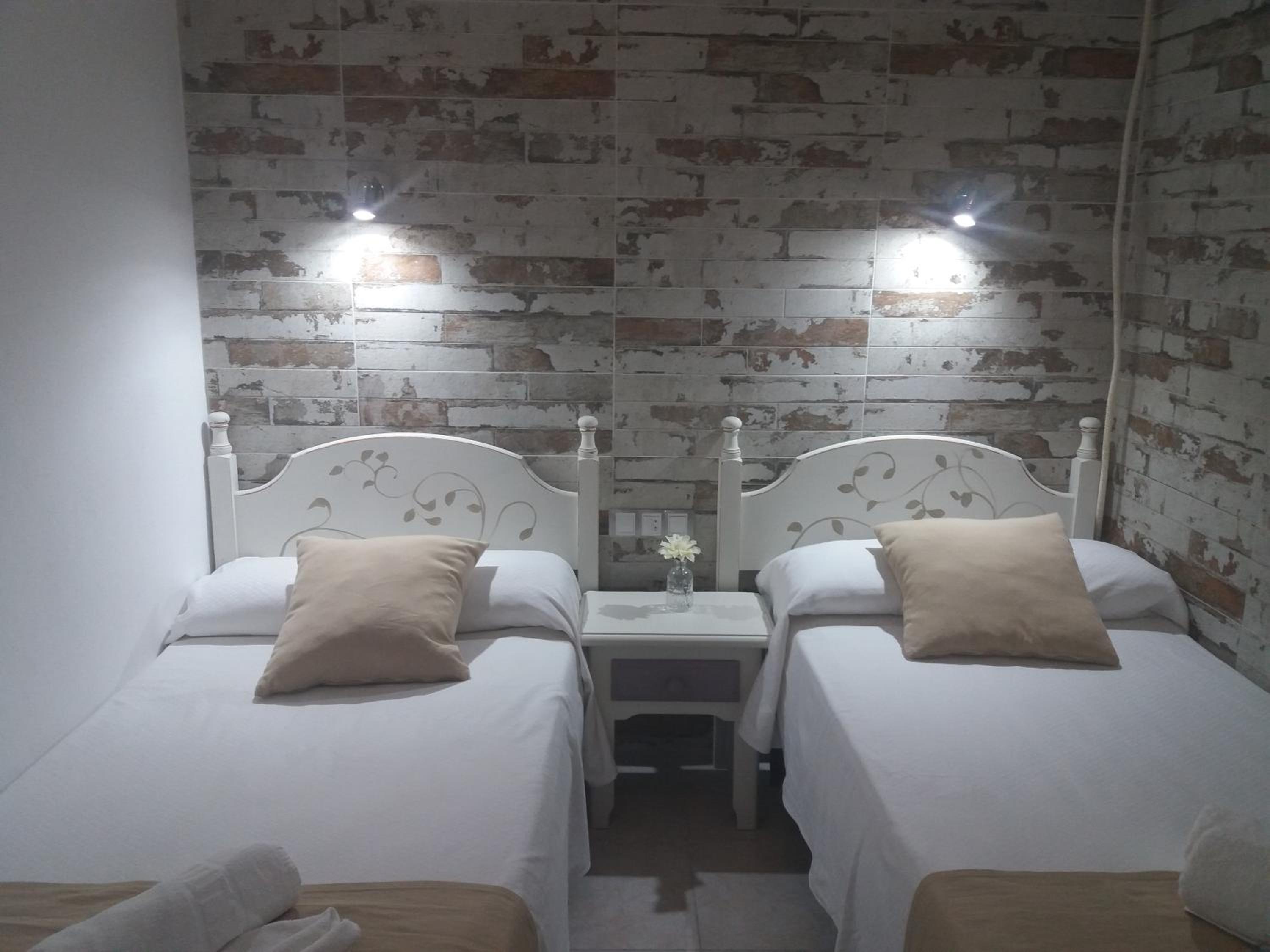 Habitación Doble con Baño Externo Compartido