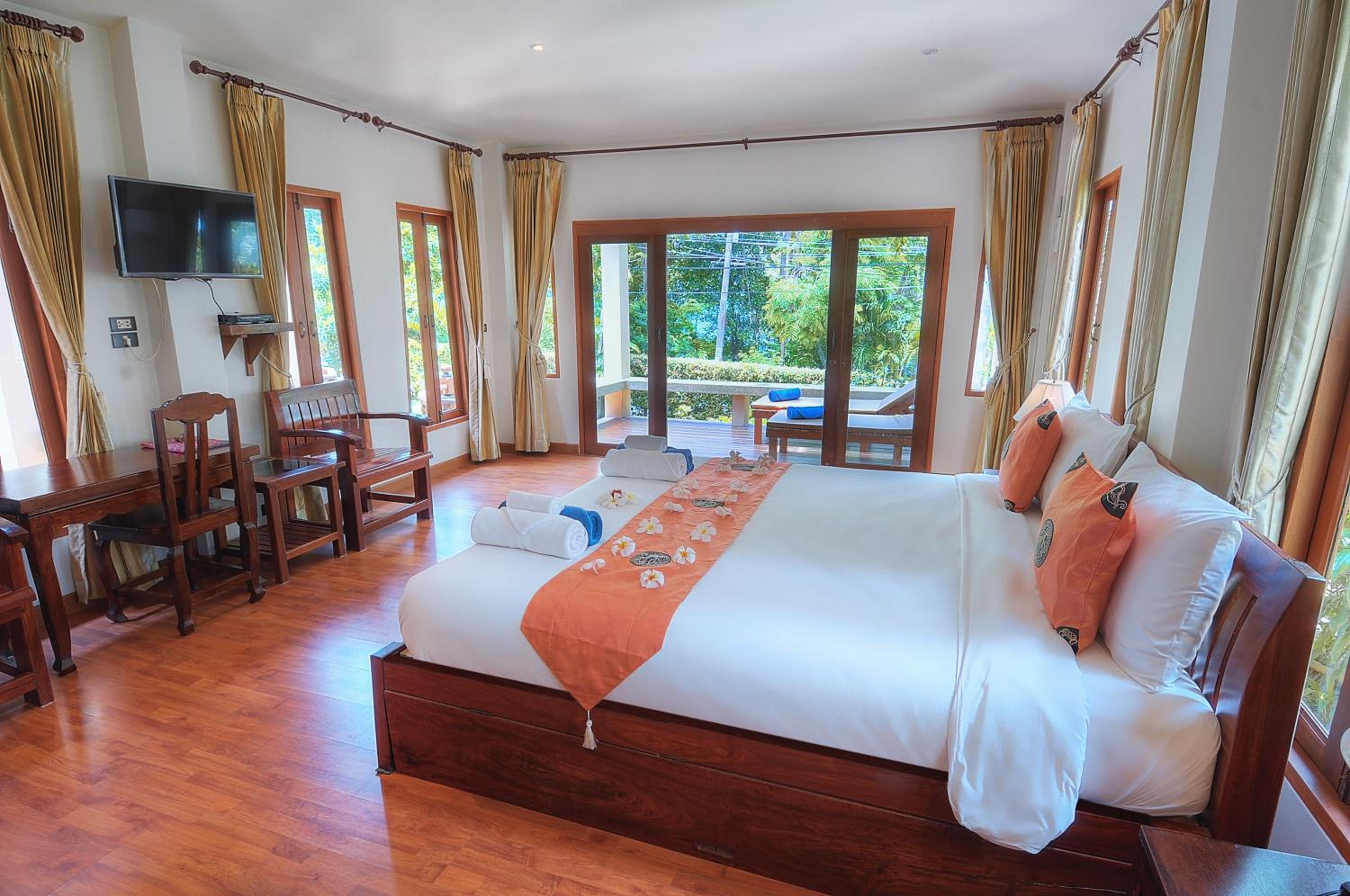 Bangalô com Cama King e Vista para o Jardim